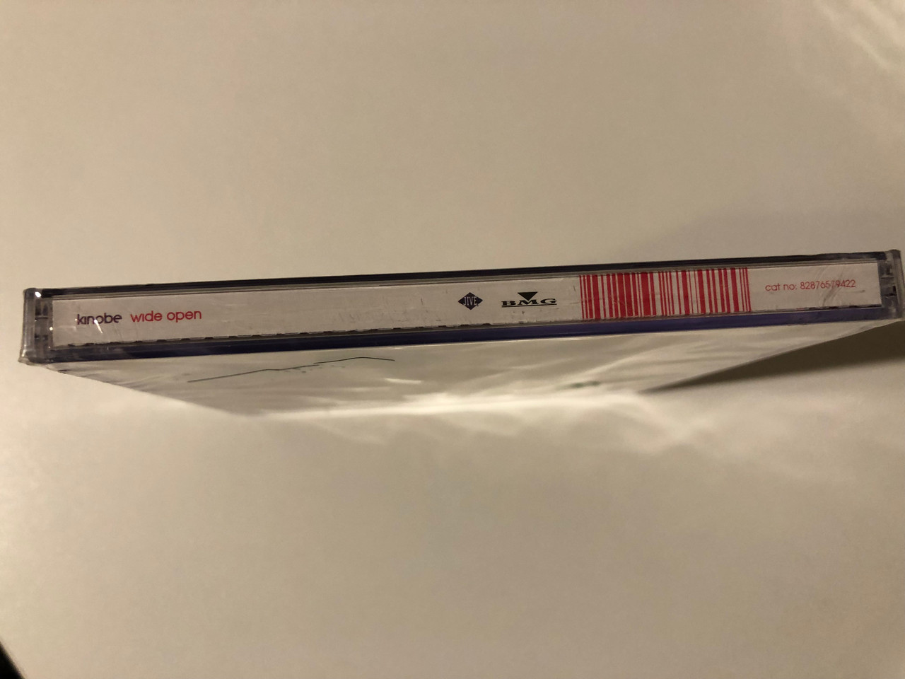 https://cdn10.bigcommerce.com/s-62bdpkt7pb/products/0/images/209400/Kinobe_Wide_Open_Jive_Audio_CD_2004_82876579422_3__76928.1643300327.1280.1280.JPG?c=2&_gl=1*1g03i4l*_ga*MjA2NTIxMjE2MC4xNTkwNTEyNTMy*_ga_WS2VZYPC6G*MTY0MzI5NTg5Ni4yNzUuMS4xNjQzMzAwNDA0LjYw