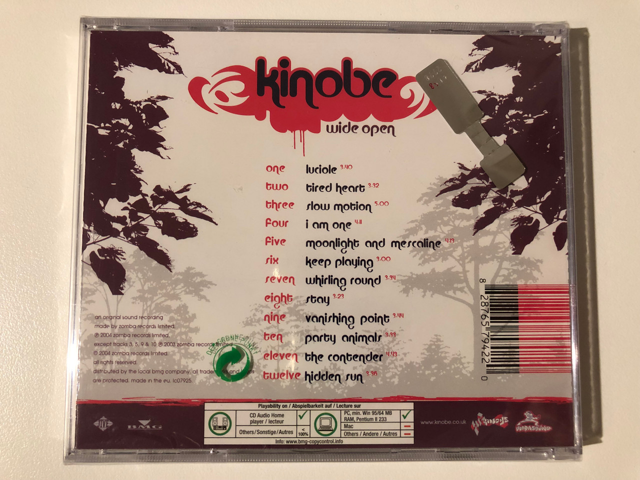 https://cdn10.bigcommerce.com/s-62bdpkt7pb/products/0/images/209401/Kinobe_Wide_Open_Jive_Audio_CD_2004_82876579422_2__70636.1643300328.1280.1280.JPG?c=2&_gl=1*1dpmmc2*_ga*MjA2NTIxMjE2MC4xNTkwNTEyNTMy*_ga_WS2VZYPC6G*MTY0MzI5NTg5Ni4yNzUuMS4xNjQzMzAwMTgxLjQx