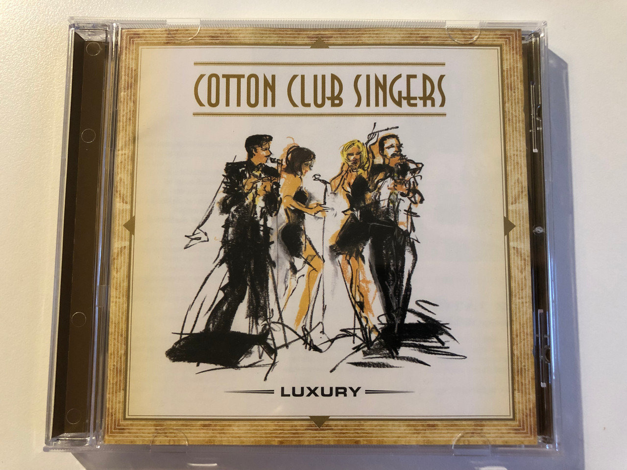 https://cdn10.bigcommerce.com/s-62bdpkt7pb/products/0/images/210065/Cotton_Club_Singers_Luxury_Geg_Records_Audio_CD_2004_GEG_010_1__99084.1643394807.1280.1280.JPG?c=2&_gl=1*1fnzofg*_ga*MjA2NTIxMjE2MC4xNTkwNTEyNTMy*_ga_WS2VZYPC6G*MTY0MzM4MjMyNi4yNzkuMS4xNjQzMzk0Nzg2LjYw