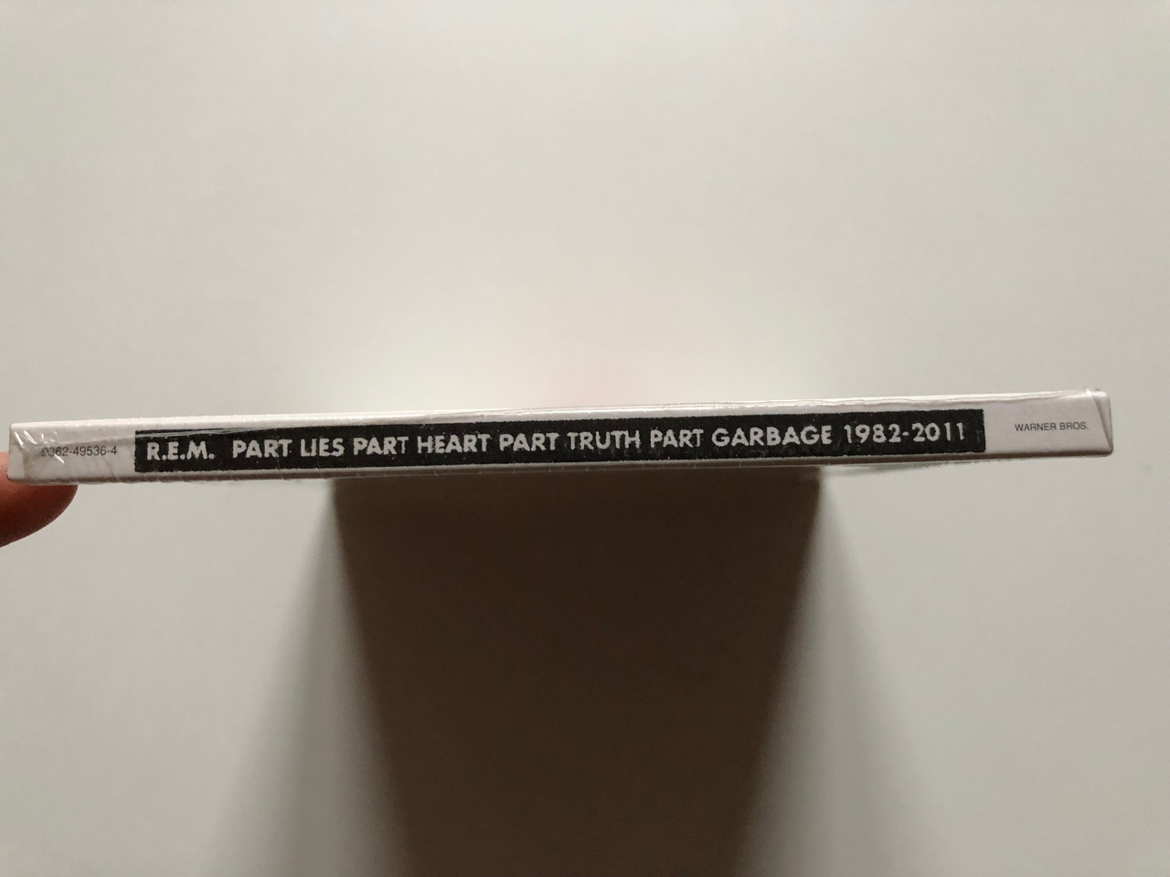 https://cdn10.bigcommerce.com/s-62bdpkt7pb/products/0/images/210504/R.E.M._Part_Lies_Part_Heart_Part_Truth_Part_Garbage_1982_-_2011_The_Greatest_Hits_1982-2011_40-Song_Career_Spanning_Retrospective_Includes_The_Hits_Man_On_The_Moon_Everybody_Hurts_Wa_3__95780.1643621756.1280.1280.JPG?c=2&_gl=1*lnf1lh*_ga*MjA2NTIxMjE2MC4xNTkwNTEyNTMy*_ga_WS2VZYPC6G*MTY0MzYxMzI3MC4yODAuMS4xNjQzNjIxNjEzLjQ4