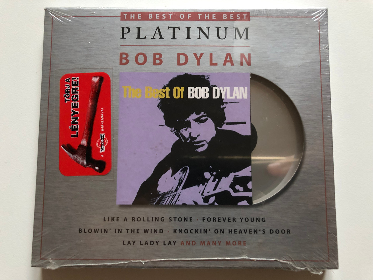 https://cdn10.bigcommerce.com/s-62bdpkt7pb/products/0/images/210518/The_Best_Of_Bob_Dylan_The_Best_Of_The_Best_-_Platinum_-_Bob_Dylan_Like_A_Rolling_Stone_Forever_Young_Blowin_In_The_Wind_Knockin_On_Heavens_Door_Lay_Lady_Lay_and_many_more_Columbia_A_1__93897.1643624098.1280.1280.JPG?c=2&_gl=1*4z4n6q*_ga*MjA2NTIxMjE2MC4xNTkwNTEyNTMy*_ga_WS2VZYPC6G*MTY0MzYxMzI3MC4yODAuMS4xNjQzNjIzNDc4LjYw