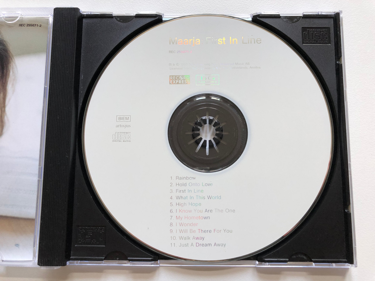 https://cdn10.bigcommerce.com/s-62bdpkt7pb/products/0/images/210553/Maarja_First_In_Line_Record_Express_Audio_CD_1997_REC_255071-2_3__62183.1643628105.1280.1280.JPG?c=2&_gl=1*y2muc4*_ga*MjA2NTIxMjE2MC4xNTkwNTEyNTMy*_ga_WS2VZYPC6G*MTY0MzYxMzI3MC4yODAuMS4xNjQzNjI3OTUxLjUw