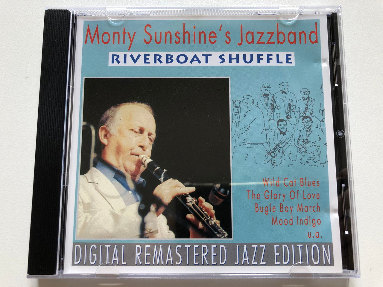 https://cdn10.bigcommerce.com/s-62bdpkt7pb/products/0/images/210683/Monty_Sunshines_Jazzband_Riverboat_Shuffle_Wildcat_Blues_The_Glorie_Of_Love_Bugle_Boy_March_Mood_Indigo_u.a._Digital_Remastered_Jazz_Edition_Pastels_Audio_CD_1995_CD_20_1__27329.1643692755.1280.1280.JPG?c=2&_gl=1*eyhnyy*_ga*MjA2NTIxMjE2MC4xNTkwNTEyNTMy*_ga_WS2VZYPC6G*MTY0MzY5MjIzNi4yODEuMS4xNjQzNjkyNTc4LjM3
