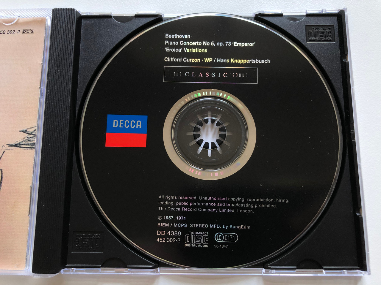 https://cdn10.bigcommerce.com/s-62bdpkt7pb/products/0/images/210782/Curzon_-_Beethoven_-_Piano_Concerto_No._5_Eroica_Variations_-_Emperor_Wiener_Philharmoniker_Hans_Knappertsbusch_The_Classic_Sound_Decca_Audio_CD_1996_Stereo_452_302-2_3__89030.1643700529.1280.1280.JPG?c=2&_gl=1*em86zm*_ga*MjA2NTIxMjE2MC4xNTkwNTEyNTMy*_ga_WS2VZYPC6G*MTY0MzY5MjIzNi4yODEuMS4xNjQzNzAwMDMxLjIx
