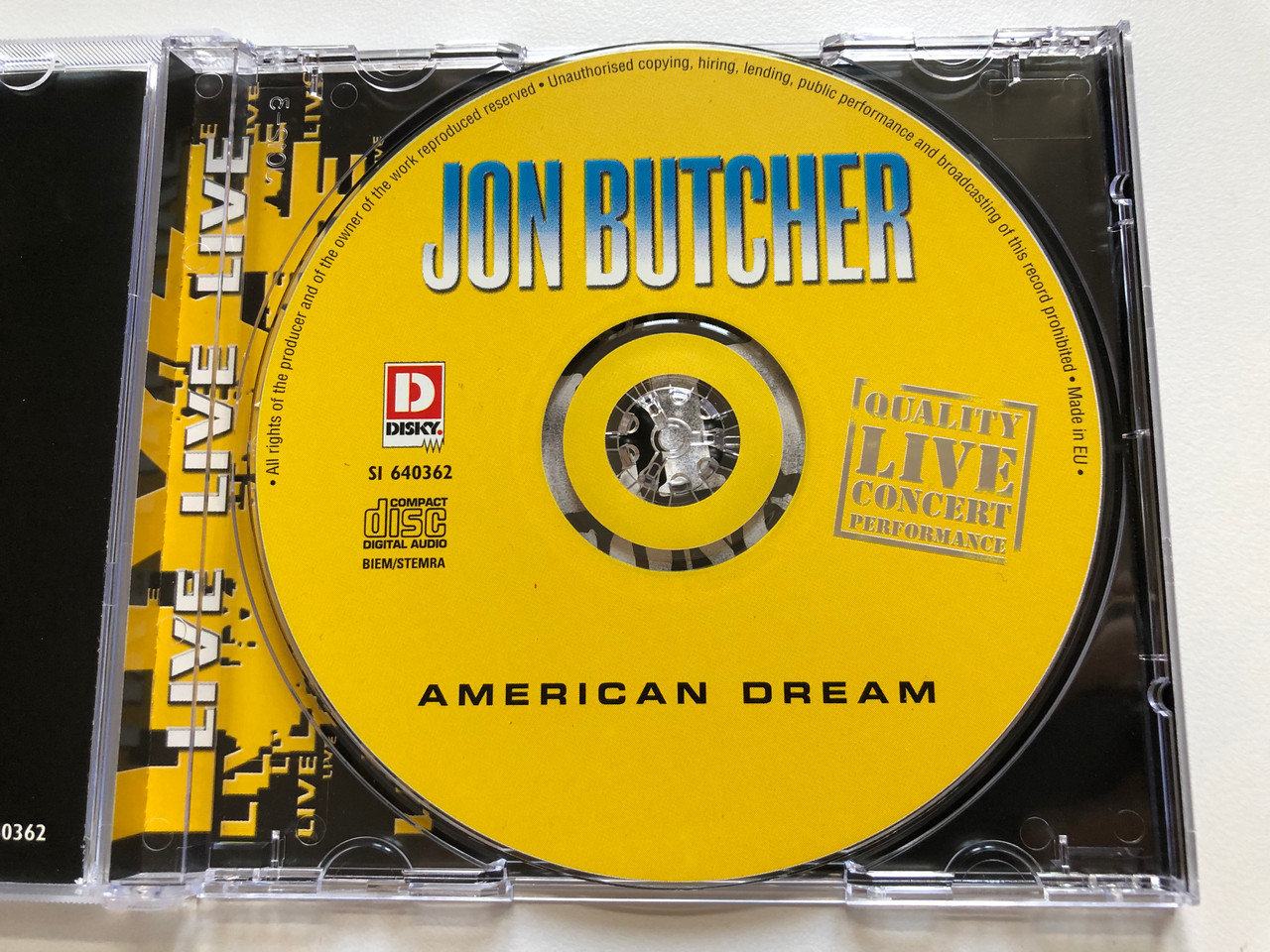 https://cdn10.bigcommerce.com/s-62bdpkt7pb/products/0/images/210869/Jon_Butcher_American_Dream_Quality_Live_Concert_Performance_Disky_Audio_CD_2001_SI_640362_3__00772.1643706672.1280.1280.JPG?c=2&_gl=1*mhhnst*_ga*MjA2NTIxMjE2MC4xNTkwNTEyNTMy*_ga_WS2VZYPC6G*MTY0MzY5MjIzNi4yODEuMS4xNjQzNzA2NTM3LjQz
