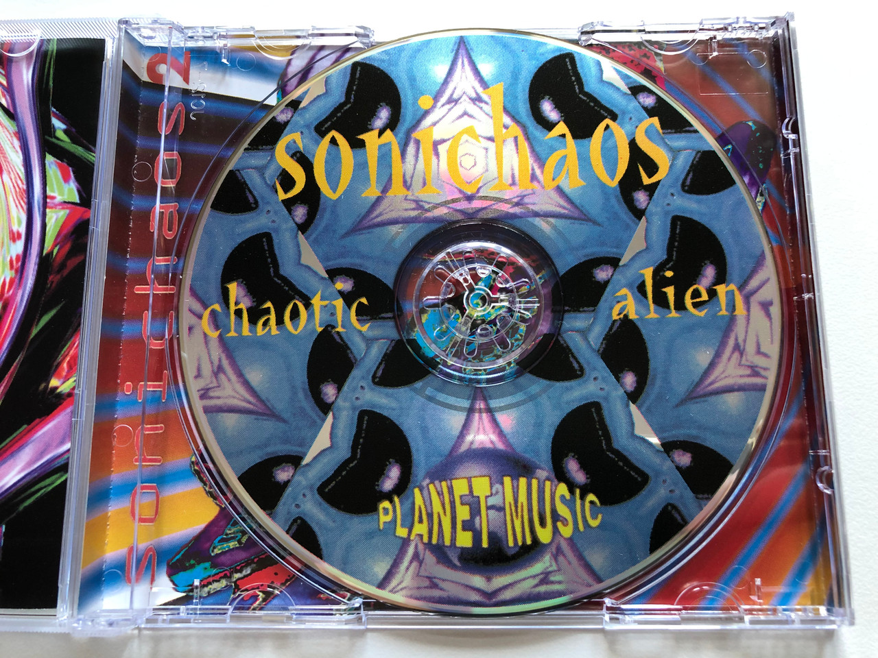 https://cdn10.bigcommerce.com/s-62bdpkt7pb/products/0/images/210939/Sonichaos_2_-_Chaotic_Alien_Planet_Music_Audio_CD_1999_07290005294358_3__17190.1643783454.1280.1280.JPG?c=2&_gl=1*19j6gyq*_ga*MjA2NTIxMjE2MC4xNTkwNTEyNTMy*_ga_WS2VZYPC6G*MTY0Mzc4MTAzOS4yODIuMS4xNjQzNzgzMzI2LjM.