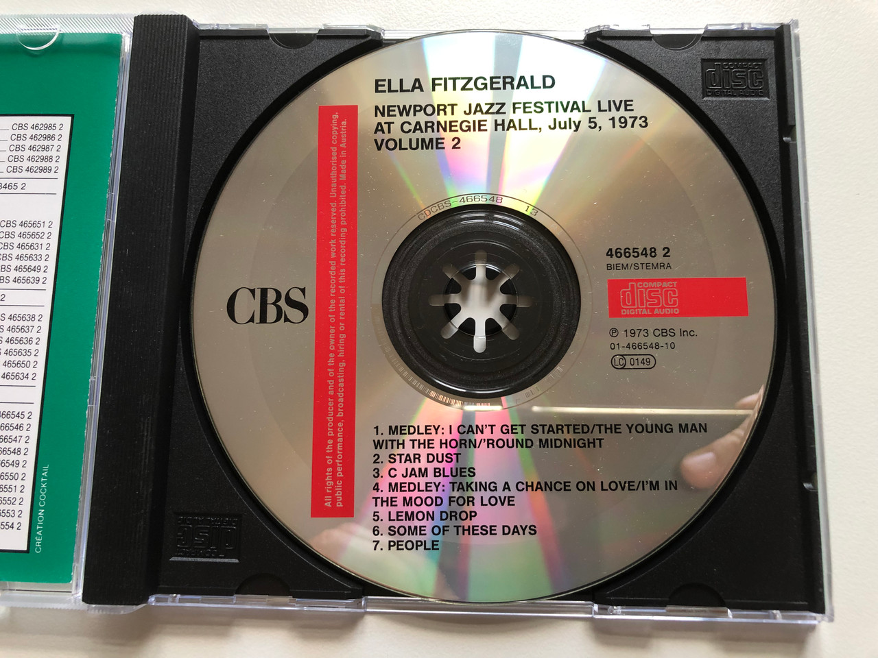 https://cdn10.bigcommerce.com/s-62bdpkt7pb/products/0/images/211697/Ella_Fitzgerald_Newport_Jazz_Festival_-_Vol._2_Live_At_Carnegie_Hall_July_5_1973_Jazzotheque_Audio_CD_1990_CBS_466548_2_3__14604.1643956188.1280.1280.JPG?c=2&_gl=1*7sa2cw*_ga*MjA2NTIxMjE2MC4xNTkwNTEyNTMy*_ga_WS2VZYPC6G*MTY0Mzk1MjI3Ni4yODMuMS4xNjQzOTU2MDQ0LjYw