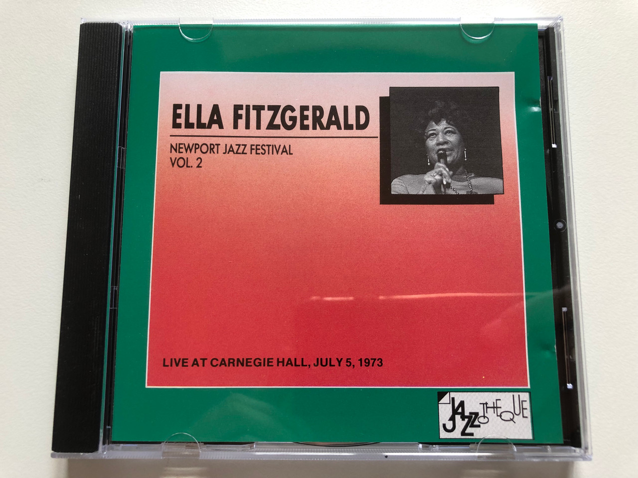 https://cdn10.bigcommerce.com/s-62bdpkt7pb/products/0/images/211698/Ella_Fitzgerald_Newport_Jazz_Festival_-_Vol._2_Live_At_Carnegie_Hall_July_5_1973_Jazzotheque_Audio_CD_1990_CBS_466548_2_1__63293.1643956188.1280.1280.JPG?c=2&_gl=1*7sa2cw*_ga*MjA2NTIxMjE2MC4xNTkwNTEyNTMy*_ga_WS2VZYPC6G*MTY0Mzk1MjI3Ni4yODMuMS4xNjQzOTU2MDQ0LjYw