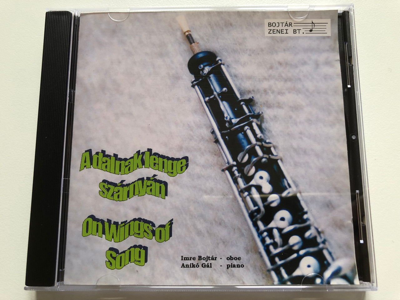 https://cdn10.bigcommerce.com/s-62bdpkt7pb/products/0/images/211725/A_dalnak_lenge_szarnyan_-_On_Wings_of_Song_Imre_Bojtar_-_oboe_Aniko_Gal_-_piano_Bojtar_Zenei_Bt._Audio_CD_2003_1__29737.1643959440.1280.1280.JPG?c=2&_gl=1*w79lau*_ga*MjA2NTIxMjE2MC4xNTkwNTEyNTMy*_ga_WS2VZYPC6G*MTY0Mzk1MjI3Ni4yODMuMS4xNjQzOTU5MjMwLjMz