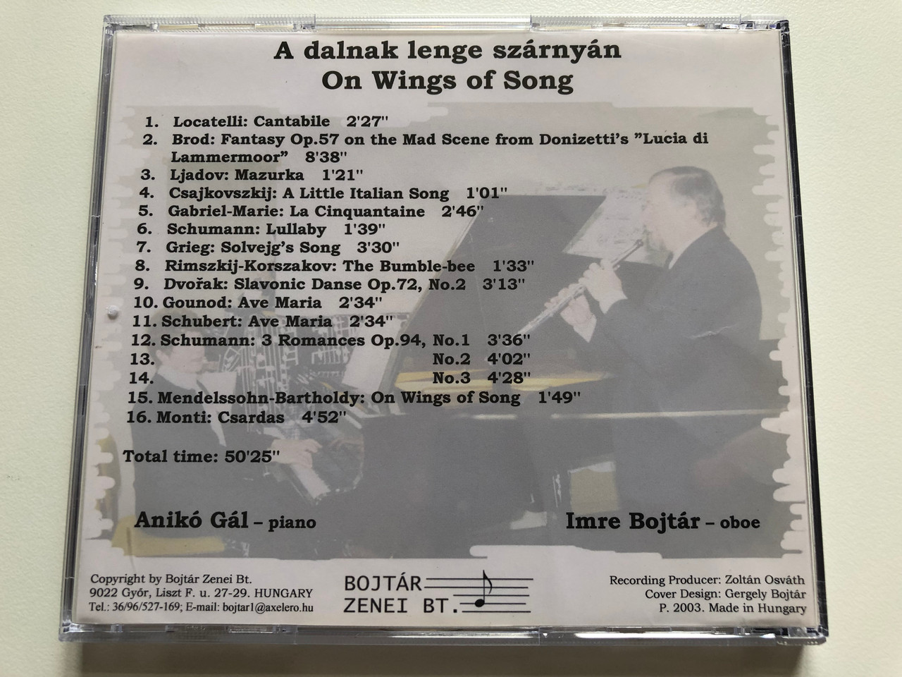 https://cdn10.bigcommerce.com/s-62bdpkt7pb/products/0/images/211727/A_dalnak_lenge_szarnyan_-_On_Wings_of_Song_Imre_Bojtar_-_oboe_Aniko_Gal_-_piano_Bojtar_Zenei_Bt._Audio_CD_2003_4__12166.1643959441.1280.1280.JPG?c=2&_gl=1*w79lau*_ga*MjA2NTIxMjE2MC4xNTkwNTEyNTMy*_ga_WS2VZYPC6G*MTY0Mzk1MjI3Ni4yODMuMS4xNjQzOTU5MjMwLjMz