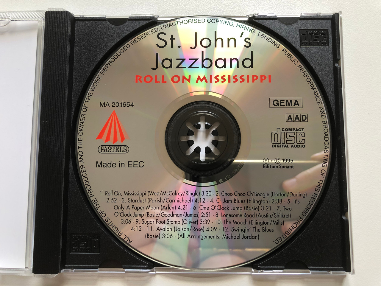 https://cdn10.bigcommerce.com/s-62bdpkt7pb/products/0/images/211731/St._Johns_Jazzband_-_Roll_On_Mississippi_C-Jam_Blues_One_O_Clock_Jump_Its_Only_A_Paper_Moon_Choo_Choo_ChBoogie_u.a._Digital_Remastered_Jazz_Edition_Pastels_Audio_CD_1995_CD_20___34858.1643960779.1280.1280.JPG?c=2&_gl=1*yai16r*_ga*MjA2NTIxMjE2MC4xNTkwNTEyNTMy*_ga_WS2VZYPC6G*MTY0Mzk1MjI3Ni4yODMuMS4xNjQzOTYwNzc2LjYw