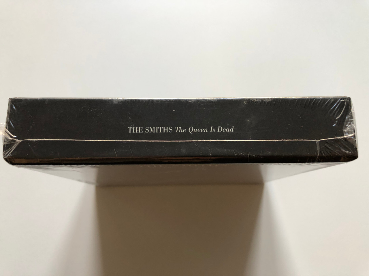 https://cdn10.bigcommerce.com/s-62bdpkt7pb/products/0/images/211757/The_Smiths_The_Queen_Is_Dead_Warner_Bros._Records_3x_Audio_CD_DVD_Video_2017_Box_Set_0190295783372_3__19963.1643972100.1280.1280.JPG?c=2&_gl=1*w3316o*_ga*MjA2NTIxMjE2MC4xNTkwNTEyNTMy*_ga_WS2VZYPC6G*MTY0Mzk3MDk2Ny4yODQuMS4xNjQzOTcxNzU5LjQ1