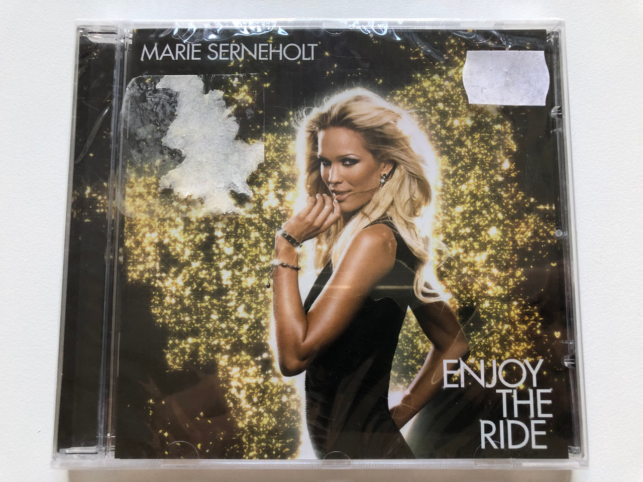 https://cdn10.bigcommerce.com/s-62bdpkt7pb/products/0/images/213266/Marie_Serneholt_Enjoy_The_Ride_Planet_Six_Audio_CD_2006_82876_80850_2_1__02256.1644959371.1280.1280.JPG?c=2&_gl=1*1rdkuob*_ga*MjA2NTIxMjE2MC4xNTkwNTEyNTMy*_ga_WS2VZYPC6G*MTY0NDk1MTQzNi4yODkuMS4xNjQ0OTU5Mjg3LjEy