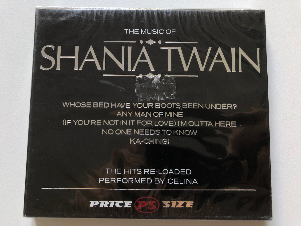 https://cdn10.bigcommerce.com/s-62bdpkt7pb/products/0/images/213299/The_Music_Of_Shania_Twain_-_Whose_Bed_Have_Boots_Been_Under_Any_Man_Of_Mine_If_Youre_Not_In_It_For_Love_Im_Outta_Here_No_One_Needs_To_Know_Ka-Ching_Promo_Sound_Audio_CD_2005_PS_1719_1__50210.1645000438.1280.1280.JPG?c=2&_gl=1*1y7bjh7*_ga*MjA2NTIxMjE2MC4xNTkwNTEyNTMy*_ga_WS2VZYPC6G*MTY0NDk5NTYyMy4yOTAuMS4xNjQ0OTk5MDEzLjU4