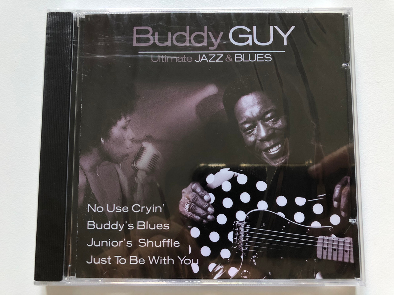 https://cdn10.bigcommerce.com/s-62bdpkt7pb/products/0/images/213302/Buddy_Guy_Ultimate_Jazz_Blues_No_Use_Crying_Buddys_Blues_Juniors_Shuffle_Just_To_Be_With_You_Weton-Wesgram_Audio_CD_2004_IECJ30001-12_1__29992.1645000949.1280.1280.JPG?c=2&_gl=1*dzepu2*_ga*MjA2NTIxMjE2MC4xNTkwNTEyNTMy*_ga_WS2VZYPC6G*MTY0NDk5NTYyMy4yOTAuMS4xNjQ1MDAwODI5LjQy