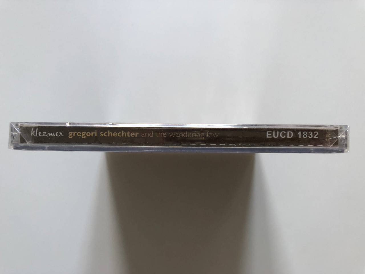 https://cdn10.bigcommerce.com/s-62bdpkt7pb/products/0/images/213325/Gregori_Schechter_and_the_wandering_few_Klezmer_ARC_Audio_CD_2003_EUCD_1832_3__79510.1645006617.1280.1280.JPG?c=2&_gl=1*ai3qyo*_ga*MjA2NTIxMjE2MC4xNTkwNTEyNTMy*_ga_WS2VZYPC6G*MTY0NDk5NTYyMy4yOTAuMS4xNjQ1MDA2NTQwLjM3