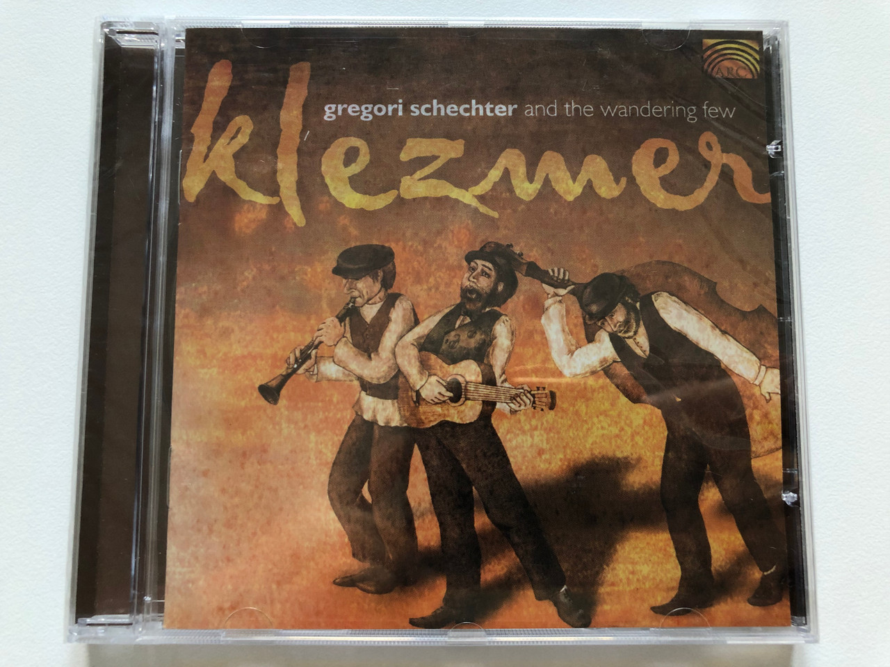 https://cdn10.bigcommerce.com/s-62bdpkt7pb/products/0/images/213326/Gregori_Schechter_and_the_wandering_few_Klezmer_ARC_Audio_CD_2003_EUCD_1832_1__85075.1645006620.1280.1280.JPG?c=2&_gl=1*ai3qyo*_ga*MjA2NTIxMjE2MC4xNTkwNTEyNTMy*_ga_WS2VZYPC6G*MTY0NDk5NTYyMy4yOTAuMS4xNjQ1MDA2NTQwLjM3