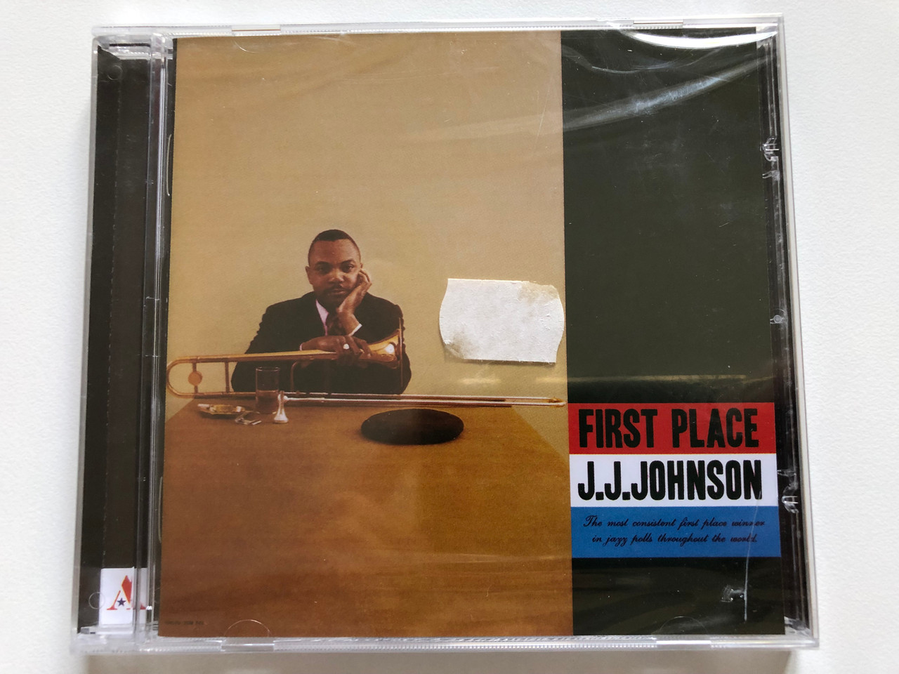 https://cdn10.bigcommerce.com/s-62bdpkt7pb/products/0/images/213332/J.J._Johnson_First_Place_American_Jazz_Classics_Audio_CD_2009_99003_1__27559.1645006977.1280.1280.JPG?c=2&_gl=1*x0nj1n*_ga*MjA2NTIxMjE2MC4xNTkwNTEyNTMy*_ga_WS2VZYPC6G*MTY0NDk5NTYyMy4yOTAuMS4xNjQ1MDA2OTA1LjQz