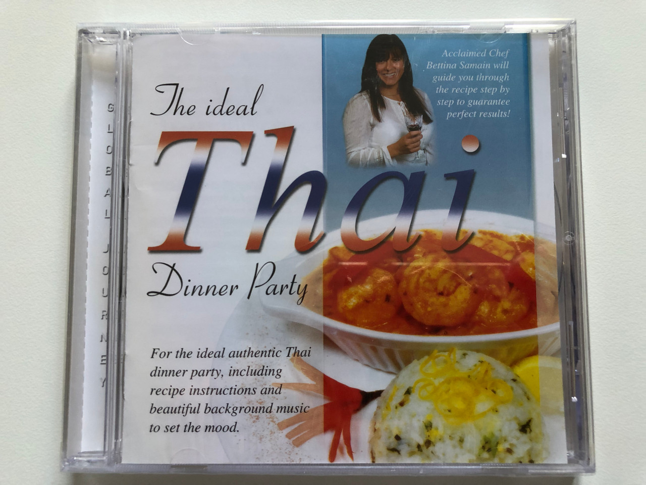 https://cdn10.bigcommerce.com/s-62bdpkt7pb/products/0/images/213372/The_Ideal_Thai_Dinner_Party_For_the_ideal_authentic_Thai_dinner_party_including_recipe_instructions_and_beautiful_background_music_to_set_the_mood._Global_Journey_Audio_CD_2004_GJ5508_1__80747.1645023356.1280.1280.JPG?c=2&_gl=1*6gy276*_ga*MjA2NTIxMjE2MC4xNTkwNTEyNTMy*_ga_WS2VZYPC6G*MTY0NTAxODQ4NS4yOTEuMS4xNjQ1MDIzMTUwLjU4