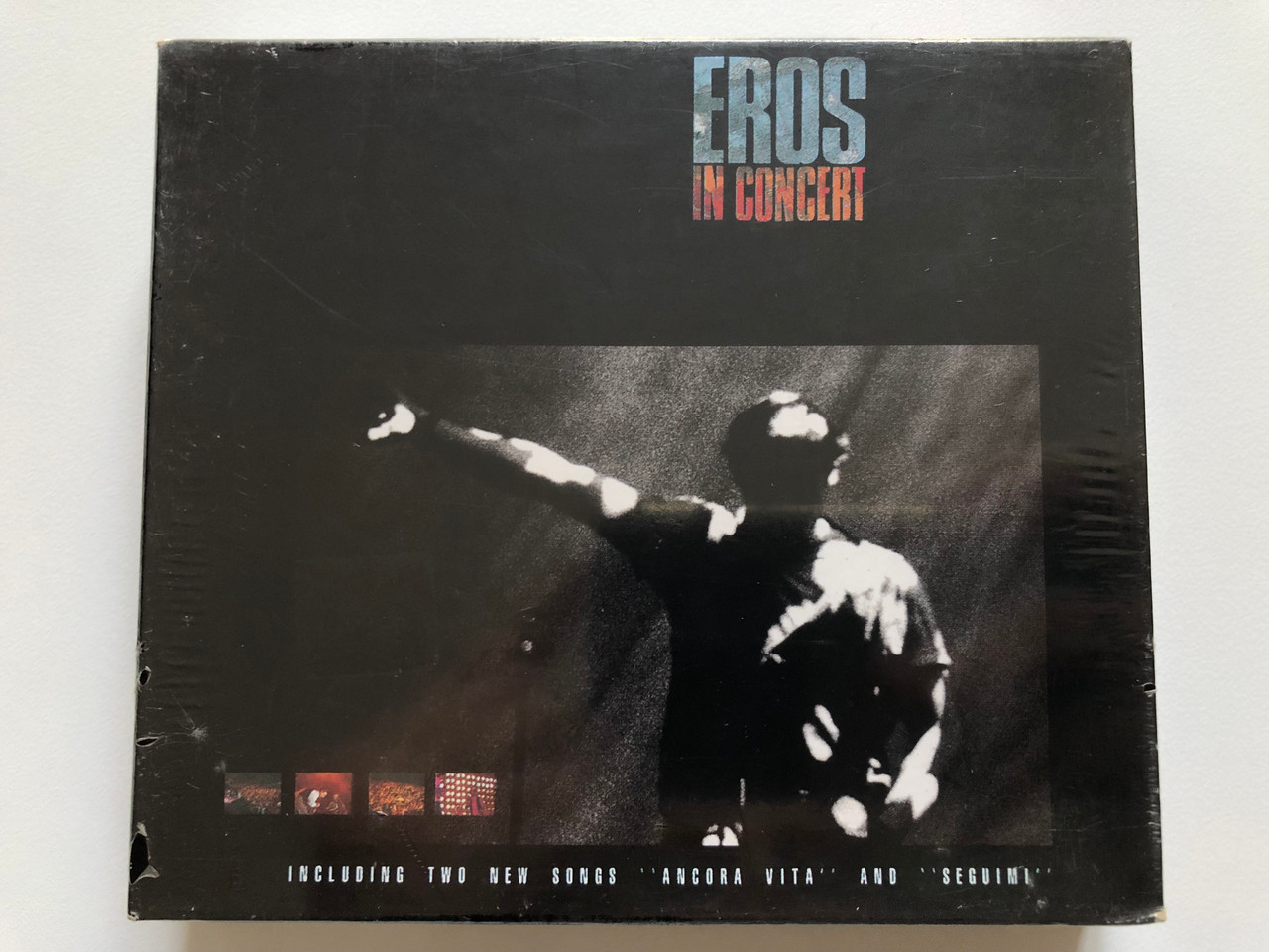https://cdn10.bigcommerce.com/s-62bdpkt7pb/products/0/images/213415/Eros_In_Concert_-_Including_Two_New_Songs_Ancora_Vita_and_Seguimi_DDD_2x_Audio_CD_1991_354_3122__71402.1645076342.1280.1280.JPG?c=2&_gl=1*t7ln4c*_ga*MjA2NTIxMjE2MC4xNTkwNTEyNTMy*_ga_WS2VZYPC6G*MTY0NTA3MzEwMy4yOTIuMS4xNjQ1MDc2MTIxLjUy