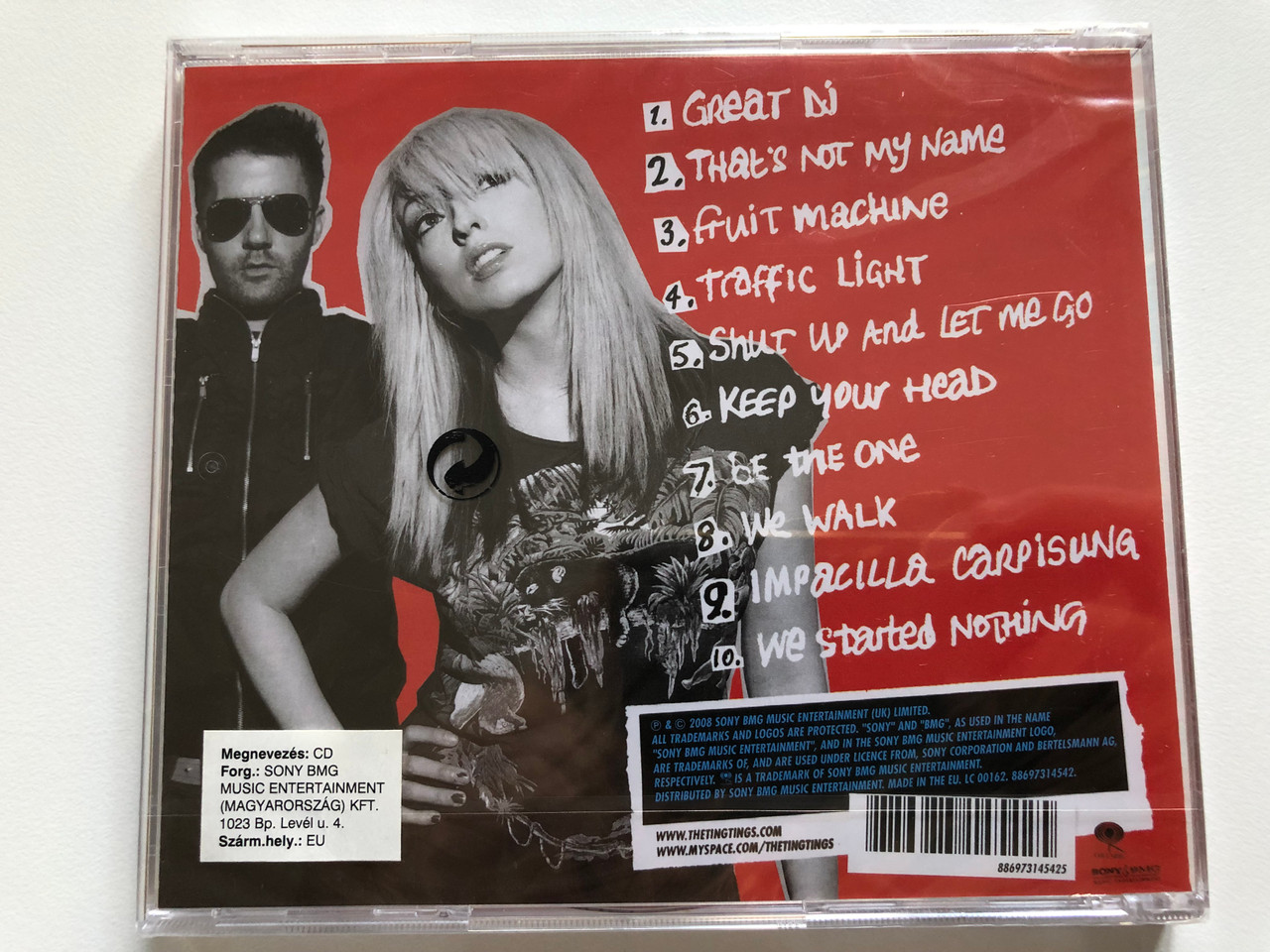 https://cdn10.bigcommerce.com/s-62bdpkt7pb/products/0/images/213442/The_Ting_Tings_We_Started_Nothing_Includes_Thats_Not_My_Name_and_Great_DJ_Columbia_Audio_CD_2008_8869731334_2__67065.1645078645.1280.1280.JPG?c=2&_gl=1*1vs8sx1*_ga*MjA2NTIxMjE2MC4xNTkwNTEyNTMy*_ga_WS2VZYPC6G*MTY0NTA3MzEwMy4yOTIuMS4xNjQ1MDc4NDg5LjIz&_ga=2.161861820.1290407815.1644815861-2065212160.1590512532