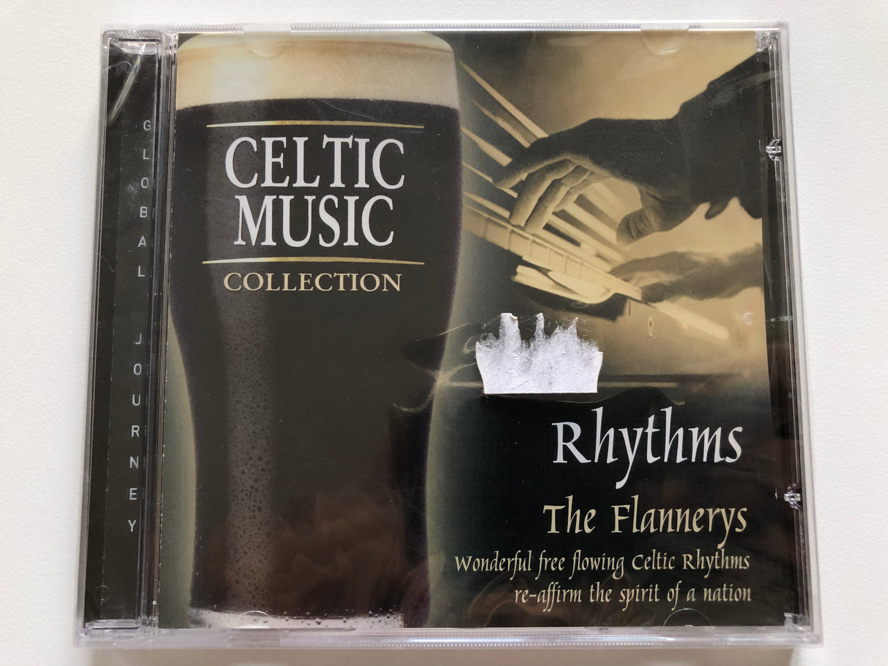 https://cdn10.bigcommerce.com/s-62bdpkt7pb/products/0/images/213444/The_Flannerys_Rhythms_Celtic_Music_Collection_Wonderful_free_flowing_Celtic_Rhythms_re-affirm_the_spirit_of_a_nation_Global_Journey_Audio_CD_2004_GJ3668_1__18139.1645079014.1280.1280.JPG?c=2&_gl=1*1vkr5hu*_ga*MjA2NTIxMjE2MC4xNTkwNTEyNTMy*_ga_WS2VZYPC6G*MTY0NTA3MzEwMy4yOTIuMS4xNjQ1MDc4ODA4LjM1
