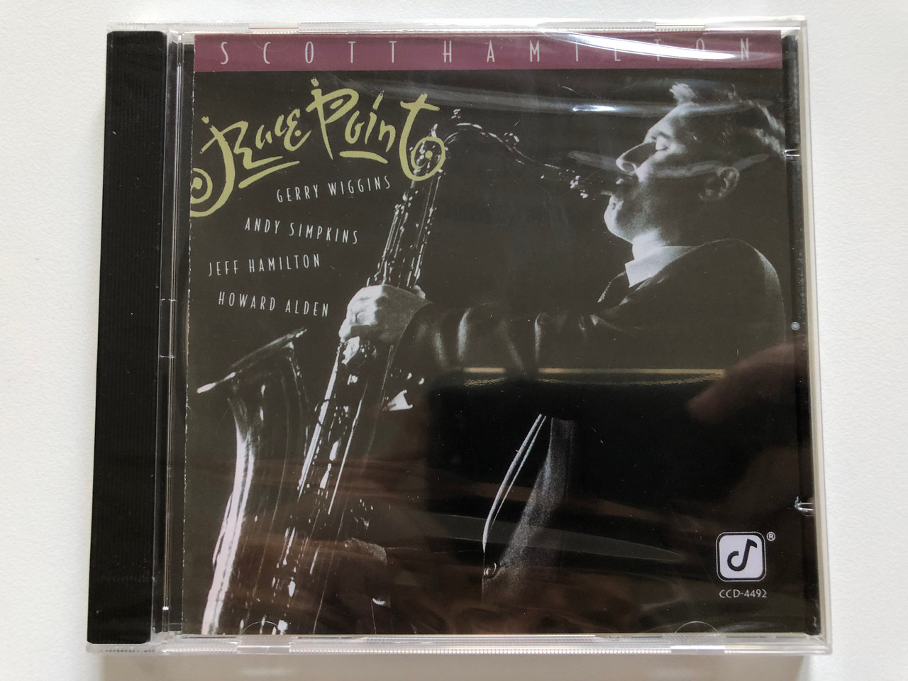 https://cdn10.bigcommerce.com/s-62bdpkt7pb/products/0/images/213453/Scott_Hamilton_-_Race_Point_-_Gerry_Wiggins_Andy_Simpkins_Jeff_Hamilton_Howard_Alden_Concord_Jazz_Audio_CD_1992_CCD_4492_1__89162.1645091523.1280.1280.JPG?c=2&_gl=1*26avvw*_ga*MjA2NTIxMjE2MC4xNTkwNTEyNTMy*_ga_WS2VZYPC6G*MTY0NTA5MTM2Ni4yOTMuMS4xNjQ1MDkxNTIxLjYw