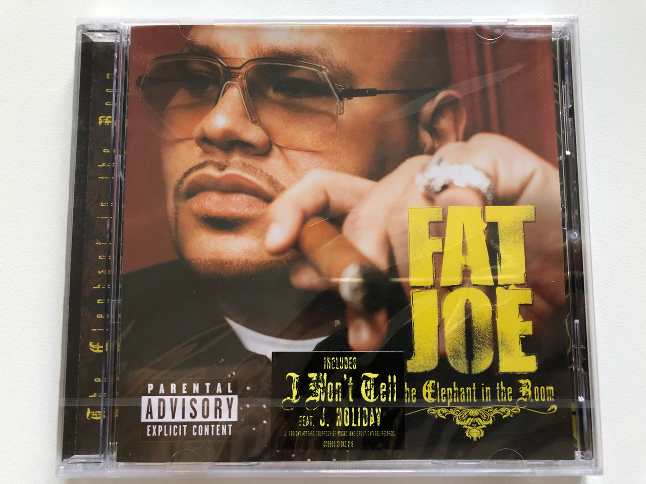 https://cdn10.bigcommerce.com/s-62bdpkt7pb/products/0/images/213512/Fat_Joe_The_Elephant_In_The_Room_Includes_I_Wont_Tell_feat._J._Holiday_Terror_Squad_Entertainment_Audio_CD_2008_509995_21012_2_9_1__77913.1645097280.1280.1280.JPG?c=2&_gl=1*1qtiixe*_ga*MjA2NTIxMjE2MC4xNTkwNTEyNTMy*_ga_WS2VZYPC6G*MTY0NTA5MTM2Ni4yOTMuMS4xNjQ1MDk3MTUyLjEw