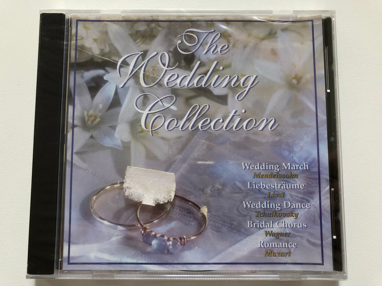 https://cdn10.bigcommerce.com/s-62bdpkt7pb/products/0/images/213515/The_Wedding_Collection_Wedding_March_-_Mendelssohn_Liebestraume_-_Liszt_Wedding_Dance_-_Tchaikovsky_Bridal_Chorus_-_Wagner_Romance_-_Mozart_United_Audio_Entertainment_Audio_CD_1999_AK_1_1__41862.1645161178.1280.1280.JPG?c=2&_gl=1*1opccf1*_ga*MjA2NTIxMjE2MC4xNTkwNTEyNTMy*_ga_WS2VZYPC6G*MTY0NTE2MDg1Ni4yOTQuMS4xNjQ1MTYxMTM3LjYw