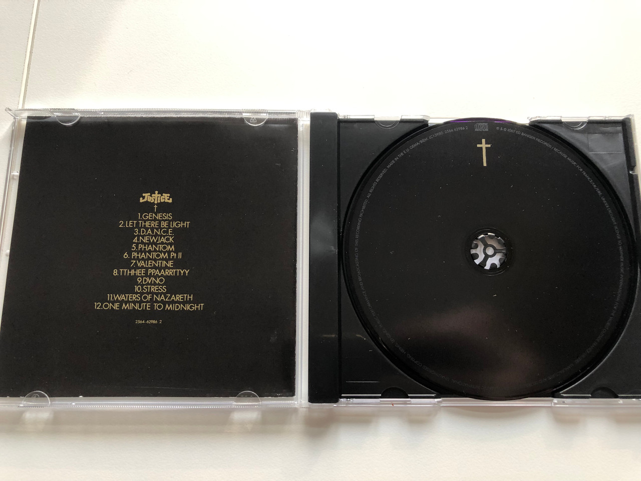 https://cdn10.bigcommerce.com/s-62bdpkt7pb/products/0/images/213613/Justice_Cross_Ed_Banger_Records_Audio_CD_2007_2564_62986_2_2__56045.1645172961.1280.1280.JPG?c=2&_gl=1*1cqy4sc*_ga*MjA2NTIxMjE2MC4xNTkwNTEyNTMy*_ga_WS2VZYPC6G*MTY0NTE2MDg1Ni4yOTQuMS4xNjQ1MTcyNzg2LjE4
