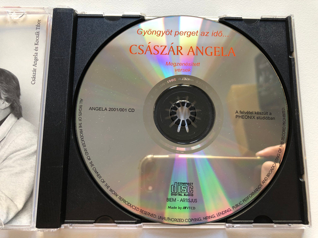 https://cdn10.bigcommerce.com/s-62bdpkt7pb/products/0/images/213795/Csaszar_Angela_-_Megzenesitett_versek_-_Gyongyot_perget_az_ido..._Phoenix_Studio_Audio_CD_2001_5999880445016_3__24483.1645461885.1280.1280.JPG?c=2&_gl=1*r8yxy8*_ga*MjA2NTIxMjE2MC4xNTkwNTEyNTMy*_ga_WS2VZYPC6G*MTY0NTQ1ODQ2NC4yOTYuMS4xNjQ1NDYxOTcwLjYw
