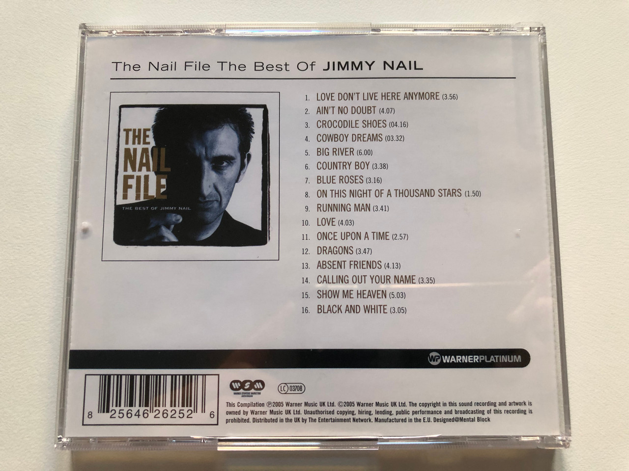 https://cdn10.bigcommerce.com/s-62bdpkt7pb/products/0/images/213842/The_Nail_File_The_Best_Of_Jimmy_Nail_Warner_Platinum_Warner_Strategic_Marketing_United_Kingdom_Audio_CD_2005_2564-62625-2_5__63454.1645464766.1280.1280.JPG?c=2&_gl=1*4c6mqv*_ga*MjA2NTIxMjE2MC4xNTkwNTEyNTMy*_ga_WS2VZYPC6G*MTY0NTQ1ODQ2NC4yOTYuMS4xNjQ1NDY0NzYyLjYw
