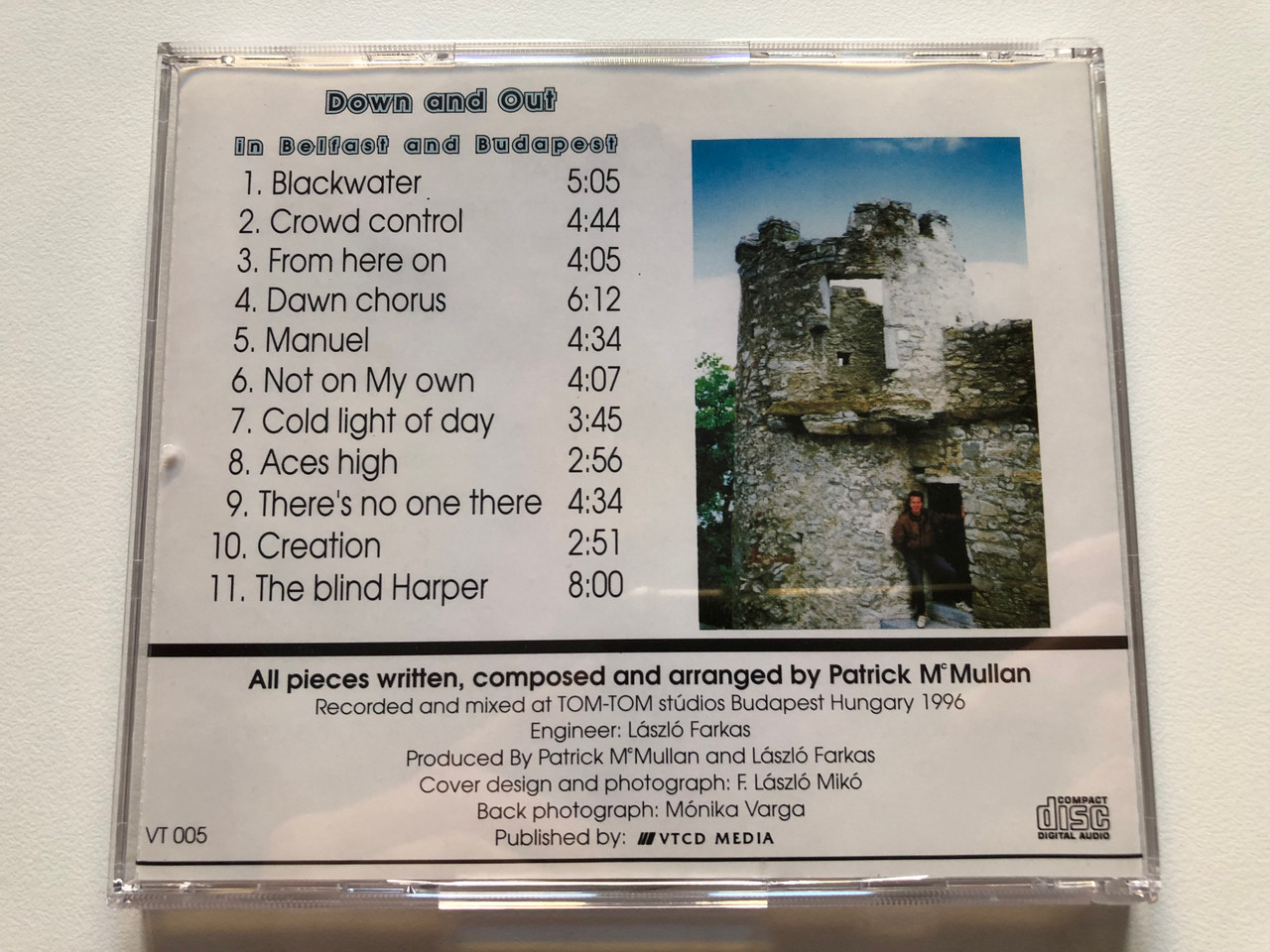 https://cdn10.bigcommerce.com/s-62bdpkt7pb/products/0/images/213851/Down_And_Out_In_Belfast_And_Budapest_-_Patrick_McMullan_VTCD_Media_Audio_CD_1997_VT_005_4__95373.1645465398.1280.1280.JPG?c=2&_gl=1*pz795i*_ga*MjA2NTIxMjE2MC4xNTkwNTEyNTMy*_ga_WS2VZYPC6G*MTY0NTQ1ODQ2NC4yOTYuMS4xNjQ1NDY1MjkxLjU4