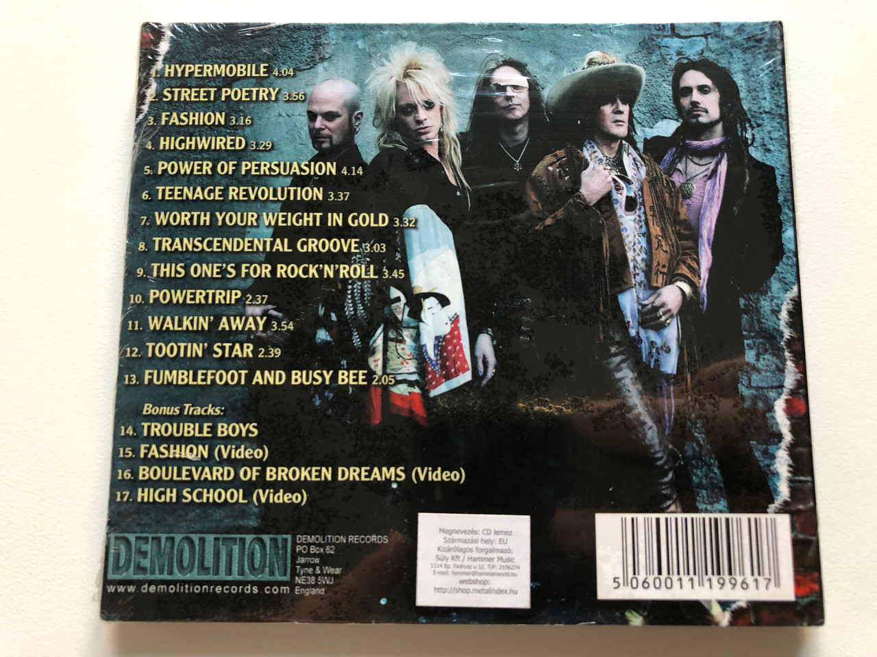 https://cdn10.bigcommerce.com/s-62bdpkt7pb/products/0/images/213905/Hanoi_Rocks_Street_Poetry_Bonus_Tracks_1._Trouble_Boys_2._Fashion_Video_3._Boulevard_Of_Broken_Dreams_Video_4._High_School_Video_Demolition_Records_Audio_CD_DEMCDD161_2__34856.1645473063.1280.1280.JPG?c=2&_gl=1*8kq13r*_ga*MjA2NTIxMjE2MC4xNTkwNTEyNTMy*_ga_WS2VZYPC6G*MTY0NTQ1ODQ2NC4yOTYuMS4xNjQ1NDcyOTA5LjU4