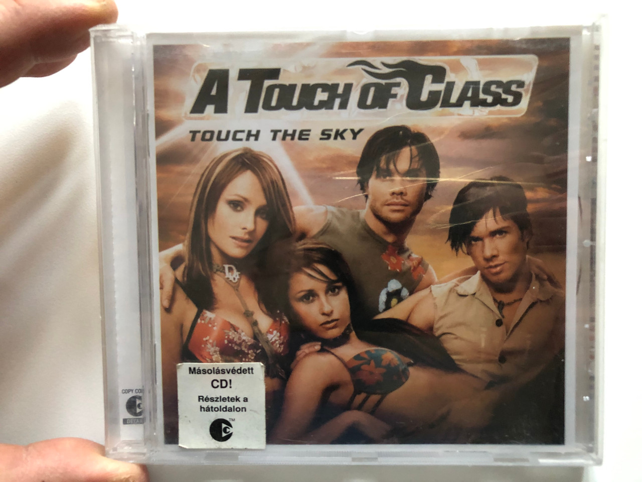 https://cdn10.bigcommerce.com/s-62bdpkt7pb/products/0/images/214017/A_Touch_Of_Class_Touch_The_Sky_King_Size_Records_Audio_CD_2003_82876_51106_2_1__92288.1645606369.1280.1280.JPG?c=2&_gl=1*1umg8yz*_ga*MjA2NTIxMjE2MC4xNTkwNTEyNTMy*_ga_WS2VZYPC6G*MTY0NTYwNjA3Ni4yOTguMC4xNjQ1NjA2MDc2LjYw