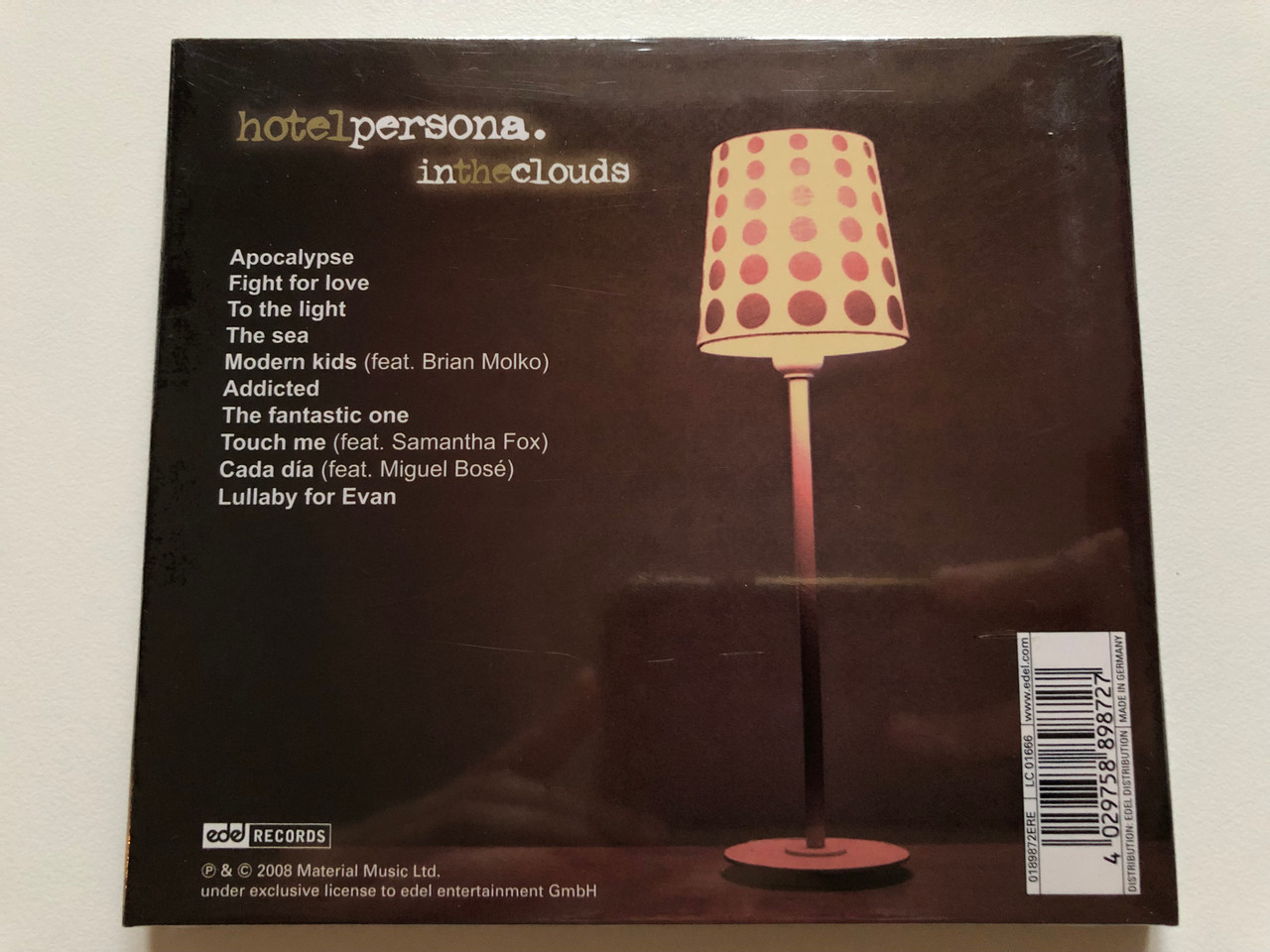 https://cdn10.bigcommerce.com/s-62bdpkt7pb/products/0/images/214079/Hotel_Persona_In_The_Clouds_Stunning_debut_album_from_Hotel_Persona_Stefan_Olsdal_Placebo_new_project_with_cpecial_guest_vocals_from_Brian_Molko_Miguel_Bose_Samantha_Fox_Edel_Reco__02941.1645613740.1280.1280.JPG?c=2&_gl=1*9slrqv*_ga*MjA2NTIxMjE2MC4xNTkwNTEyNTMy*_ga_WS2VZYPC6G*MTY0NTYwNjA3Ni4yOTguMS4xNjQ1NjEzNzE0LjYw