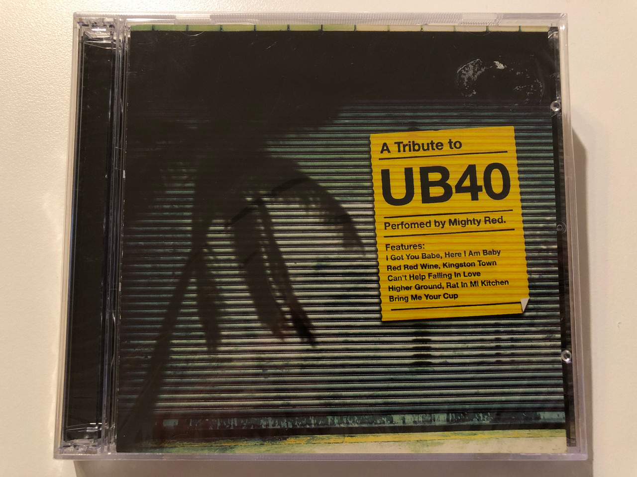 https://cdn10.bigcommerce.com/s-62bdpkt7pb/products/0/images/214218/A_Tribute_To_UB40_-_Performed_by_Mighty_Red._Features_I_Got_You_Babe_Red_Red_Wine_Kingston_Town_Cant_Help_Falling_In_Love_Higher_Ground_Rat_In_The_Kitchen_Bring_Me_Your_Cup_Horizon_R_1__53513.1645720650.1280.1280.JPG?c=2&_gl=1*uxj716*_ga*MjA2NTIxMjE2MC4xNTkwNTEyNTMy*_ga_WS2VZYPC6G*MTY0NTcxNzU2My4zMDEuMS4xNjQ1NzIwNjI0LjYw