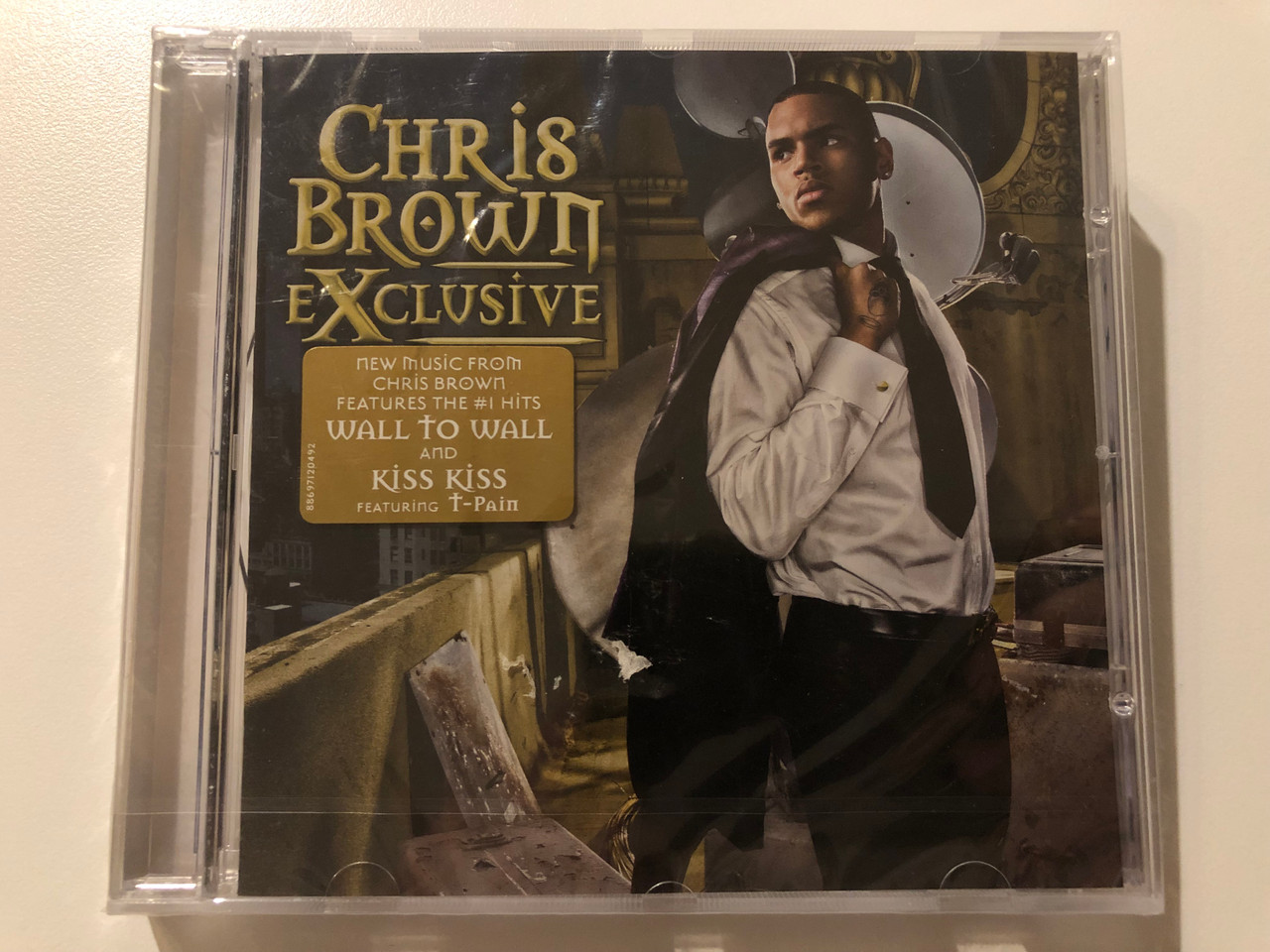 https://cdn10.bigcommerce.com/s-62bdpkt7pb/products/0/images/214307/Chris_Brown_Exclusive_New_Music_From_Chris_Brown_Features_The_1_Hits_Wall_To_Wall_And_Kiss_Kiss_Featuring_T-Pain_Jive_Audii_CD_2007_88697120492_1__06949.1645807827.1280.1280.JPG?c=2&_gl=1*1wuubly*_ga*MjA2NTIxMjE2MC4xNTkwNTEyNTMy*_ga_WS2VZYPC6G*MTY0NTgwNzUxNC4zMDMuMS4xNjQ1ODA3NjU1LjM3