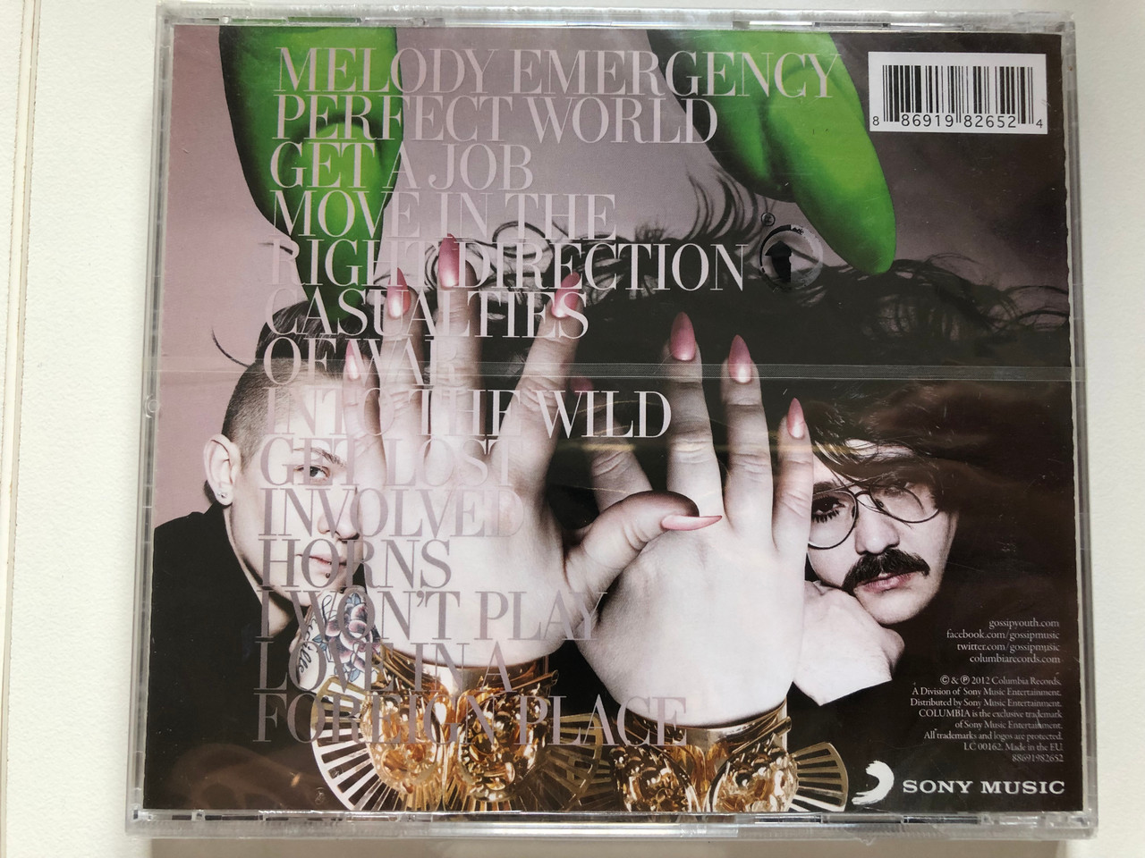 https://cdn10.bigcommerce.com/s-62bdpkt7pb/products/0/images/214429/Gossip_A_Joyful_Noise_The_New_Album_Featuring_Perfect_World_Move_In_The_Right_Direction_Columbia_Audio_CD_2012_88691982652_2__11481.1646023525.1280.1280.JPG?c=2&_gl=1*xp1bxa*_ga*MjA2NTIxMjE2MC4xNTkwNTEyNTMy*_ga_WS2VZYPC6G*MTY0NjAxOTM2NS4zMDQuMS4xNjQ2MDIyNzk3LjI1