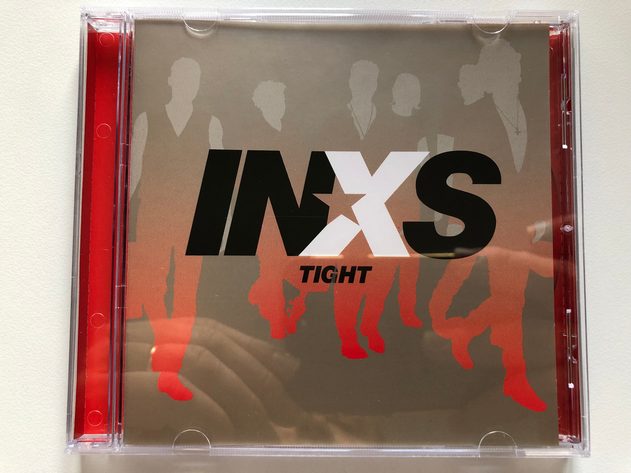 https://cdn10.bigcommerce.com/s-62bdpkt7pb/products/0/images/214450/INXS_Tight_Mercury_Audio_CD_2002_0638852_1__29337.1646026484.1280.1280.JPG?c=2&_gl=1*14eyiqo*_ga*MjA2NTIxMjE2MC4xNTkwNTEyNTMy*_ga_WS2VZYPC6G*MTY0NjAxOTM2NS4zMDQuMS4xNjQ2MDI1OTA5LjQz