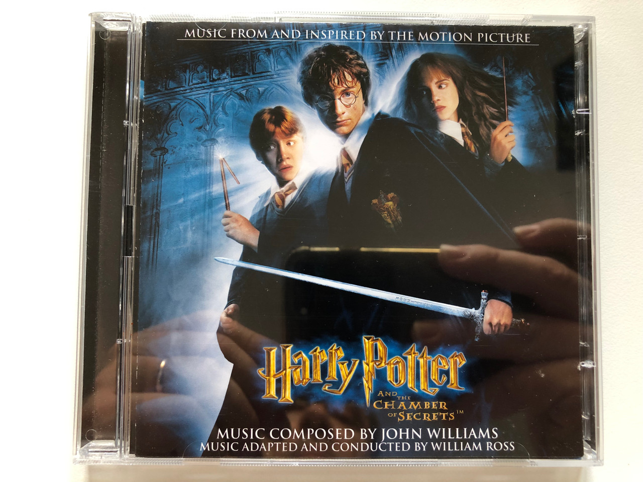 https://cdn10.bigcommerce.com/s-62bdpkt7pb/products/0/images/214452/Harry_Potter_And_The_Chamber_Of_Secrets_Music_From_And_Inspired_By_The_Motion_Picture_-_Music_Composed_By_John_Williams_Music_Adapted_And_Conducted_By_William_Ross_Warner_Sunset_Records_A_1__40971.1646026863.1280.1280.JPG?c=2&_gl=1*ul5rqz*_ga*MjA2NTIxMjE2MC4xNTkwNTEyNTMy*_ga_WS2VZYPC6G*MTY0NjAxOTM2NS4zMDQuMS4xNjQ2MDI2NTU4LjQx