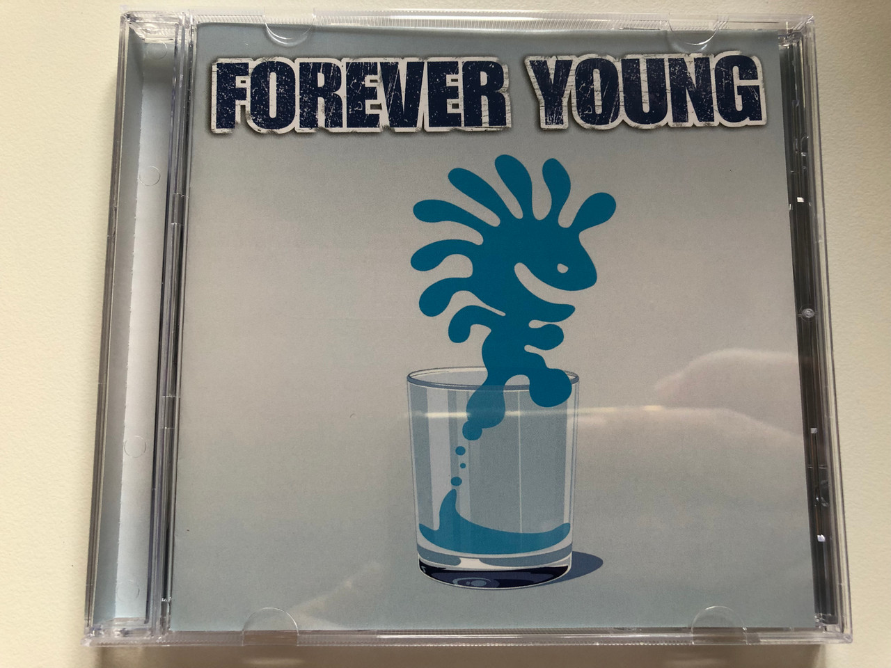 https://cdn10.bigcommerce.com/s-62bdpkt7pb/products/0/images/214458/Forever_Young_Universal_Audio_CD_2003_980_933-5_1__78211.1646027480.1280.1280.JPG?c=2&_gl=1*mqks4p*_ga*MjA2NTIxMjE2MC4xNTkwNTEyNTMy*_ga_WS2VZYPC6G*MTY0NjAxOTM2NS4zMDQuMS4xNjQ2MDI3MzYwLjMy