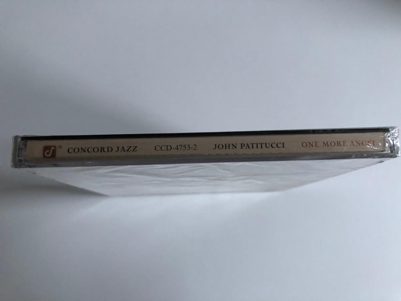 https://cdn10.bigcommerce.com/s-62bdpkt7pb/products/0/images/214704/John_Patitucci_One_More_Angel_Concord_Records_Audio_CD_1997_CCD-4753-2_3__29380.1646160954.1280.1280.JPG?c=2&_gl=1*xoe3pu*_ga*MjA2NTIxMjE2MC4xNTkwNTEyNTMy*_ga_WS2VZYPC6G*MTY0NjE0NTkwOC4zMDYuMS4xNjQ2MTYwOTI0LjYw