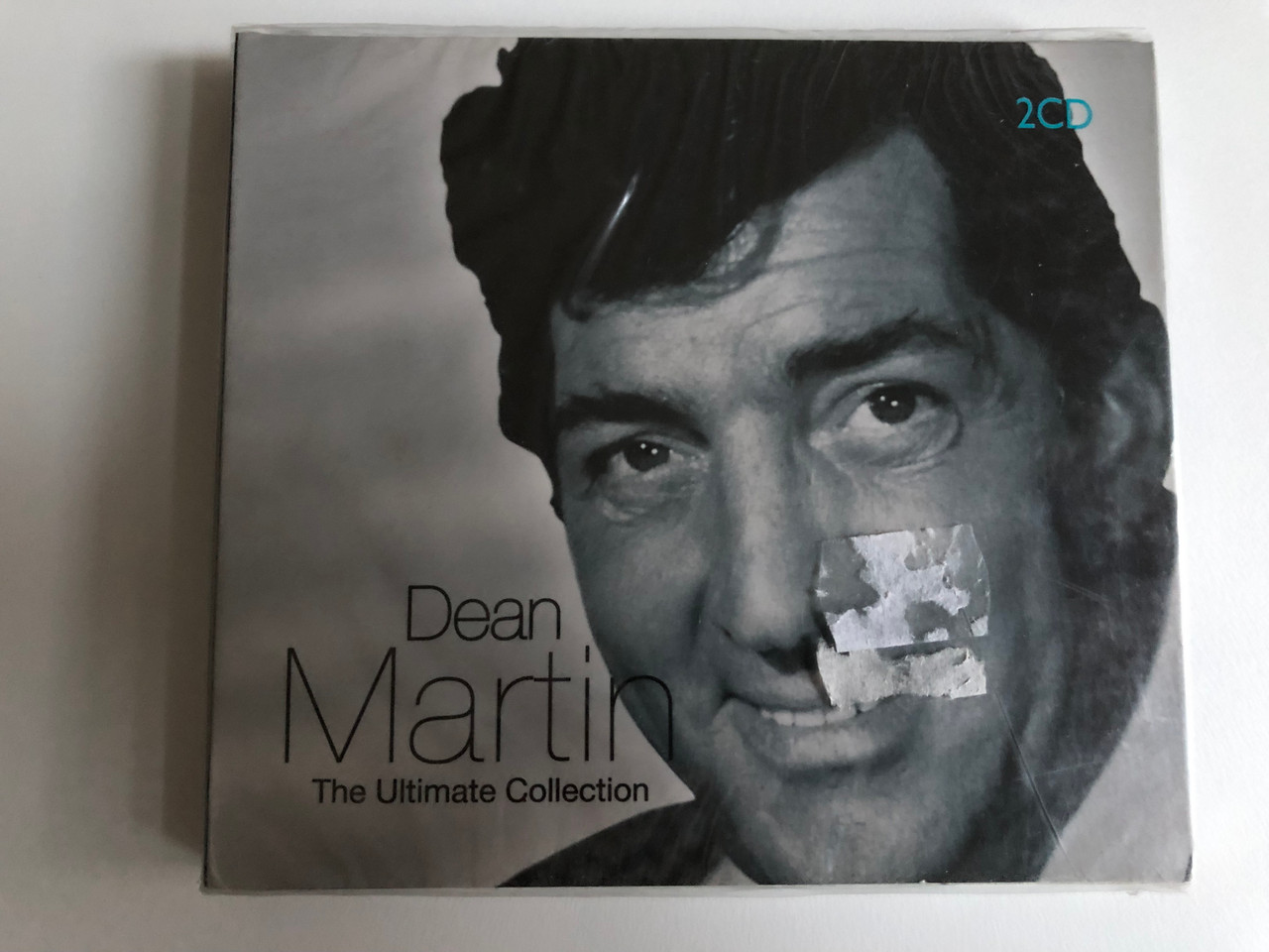 https://cdn10.bigcommerce.com/s-62bdpkt7pb/products/0/images/214713/Dean_Martin_The_Ultimate_Collection_LMM_2x_Audio_CD_2006_1302092_1__73876.1646193571.1280.1280.JPG?c=2&_gl=1*154s9hn*_ga*MjA2NTIxMjE2MC4xNTkwNTEyNTMy*_ga_WS2VZYPC6G*MTY0NjE5Mjg1NC4zMDcuMS4xNjQ2MTkzNDU3LjQz