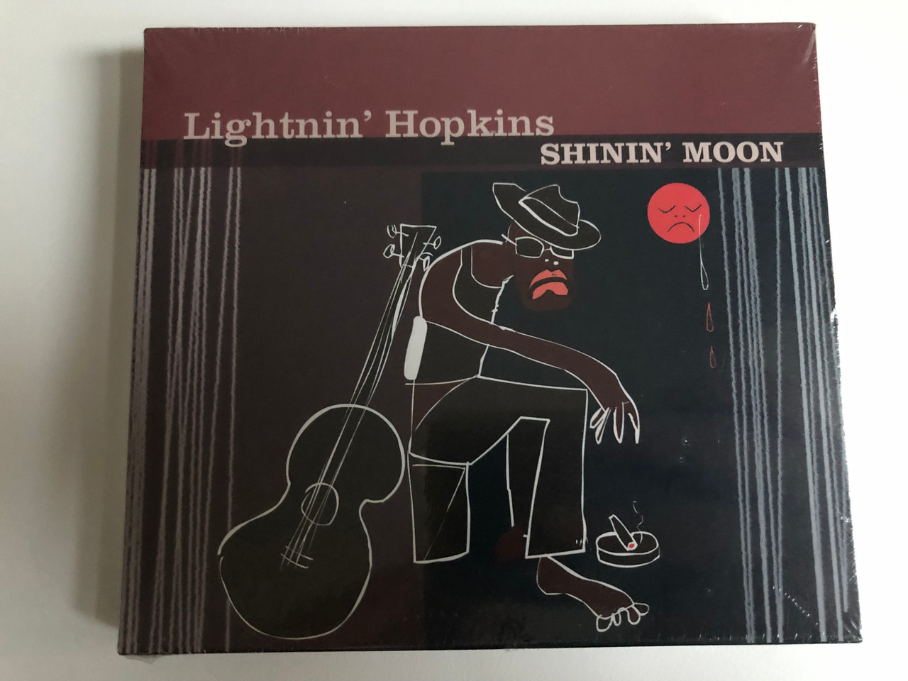 https://cdn10.bigcommerce.com/s-62bdpkt7pb/products/0/images/214717/Lightnin_Hopkins_Shinin_Moon_Kings_Road_Audio_CD_KRMCD004_1__73689.1646194384.1280.1280.JPG?c=2&_gl=1*1xtrvxf*_ga*MjA2NTIxMjE2MC4xNTkwNTEyNTMy*_ga_WS2VZYPC6G*MTY0NjE5Mjg1NC4zMDcuMS4xNjQ2MTk0MzYwLjYw