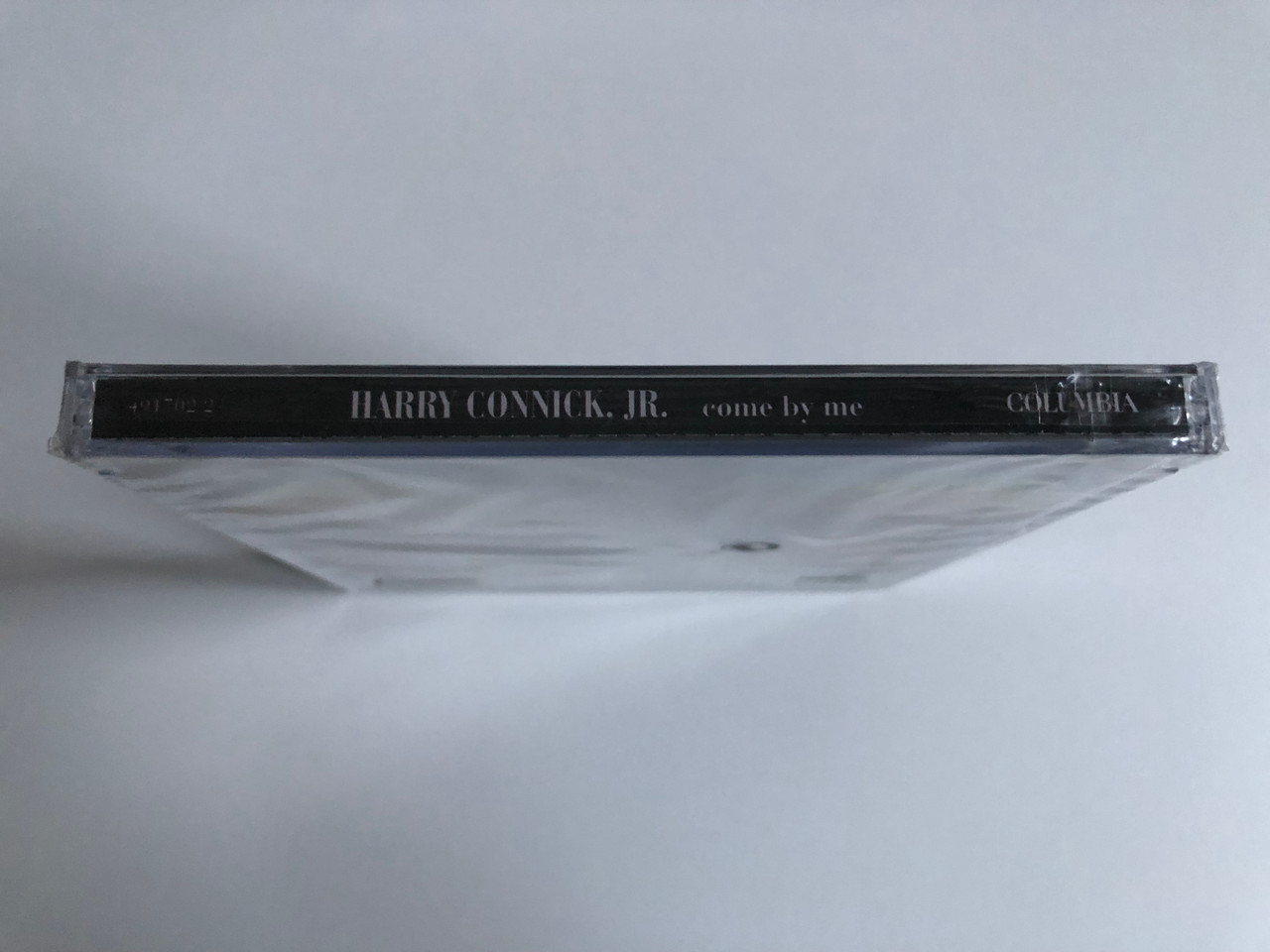 https://cdn10.bigcommerce.com/s-62bdpkt7pb/products/0/images/214729/Harry_Connick_Jr._Come_By_Me_Columbia_Audio_CD_1999_491702_2_3__10286.1646197022.1280.1280.JPG?c=2&_gl=1*zbhseq*_ga*MjA2NTIxMjE2MC4xNTkwNTEyNTMy*_ga_WS2VZYPC6G*MTY0NjE5Mjg1NC4zMDcuMS4xNjQ2MTk3MDE1LjYw