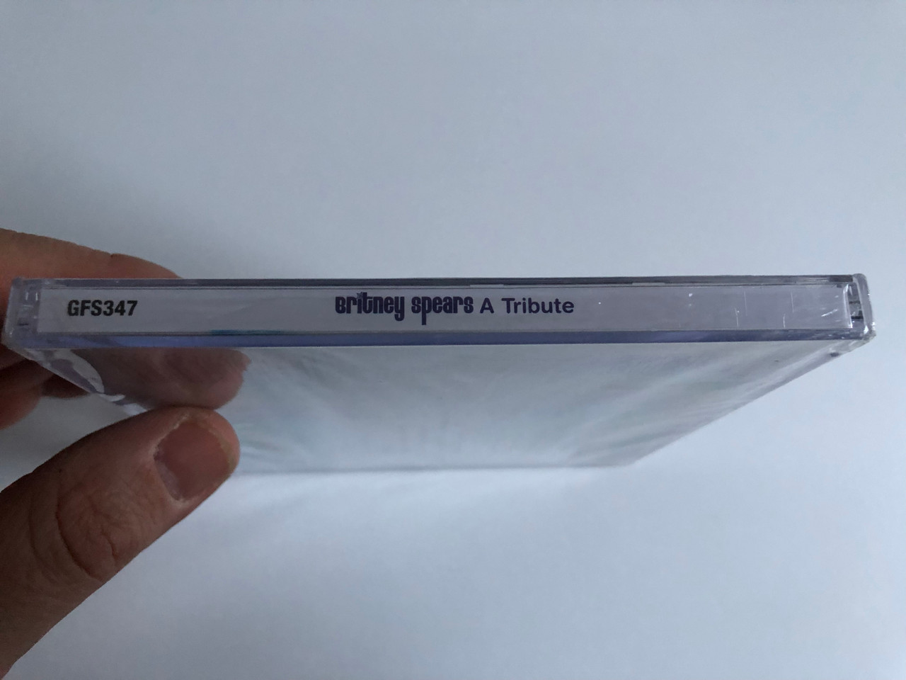 https://cdn10.bigcommerce.com/s-62bdpkt7pb/products/0/images/214737/Studio_99_Perform_A_Tribute_To_Britney_Spears_Featuring_Oops_I_Did_It_Again_Stronger_Dont_Let_Me_Be_The_Last_To_Know_Many_More_Going_For_A_Song_Audio_CD_GFS347_3__17988.1646197750.1280.1280.JPG?c=2&_gl=1*111ev37*_ga*MjA2NTIxMjE2MC4xNTkwNTEyNTMy*_ga_WS2VZYPC6G*MTY0NjE5Mjg1NC4zMDcuMS4xNjQ2MTk3NTYyLjM0