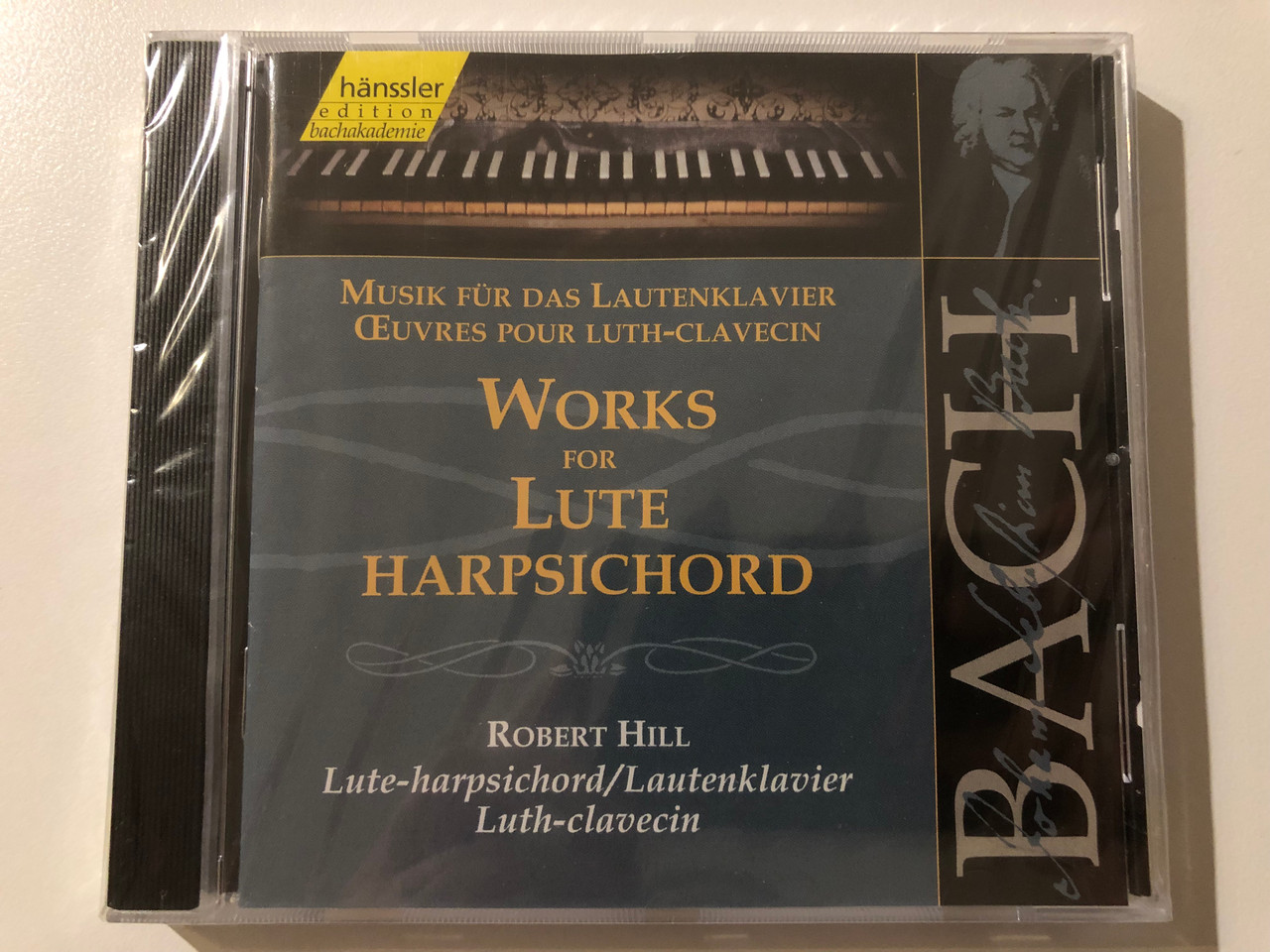 https://cdn10.bigcommerce.com/s-62bdpkt7pb/products/0/images/215000/Johann_Sebastian_Bach_-_Works_For_The_Lute-Harpsichord_Robert_Hill_lute-harpsichord_Hnssler_Edition_Bachakademie_Audio_CD_1999_CD_92_1__04182.1646405534.1280.1280.JPG?c=2&_gl=1*mnu9rc*_ga*MjA2NTIxMjE2MC4xNTkwNTEyNTMy*_ga_WS2VZYPC6G*MTY0NjM5Mzc3Ni4zMTEuMS4xNjQ2NDA1NTMzLjYw