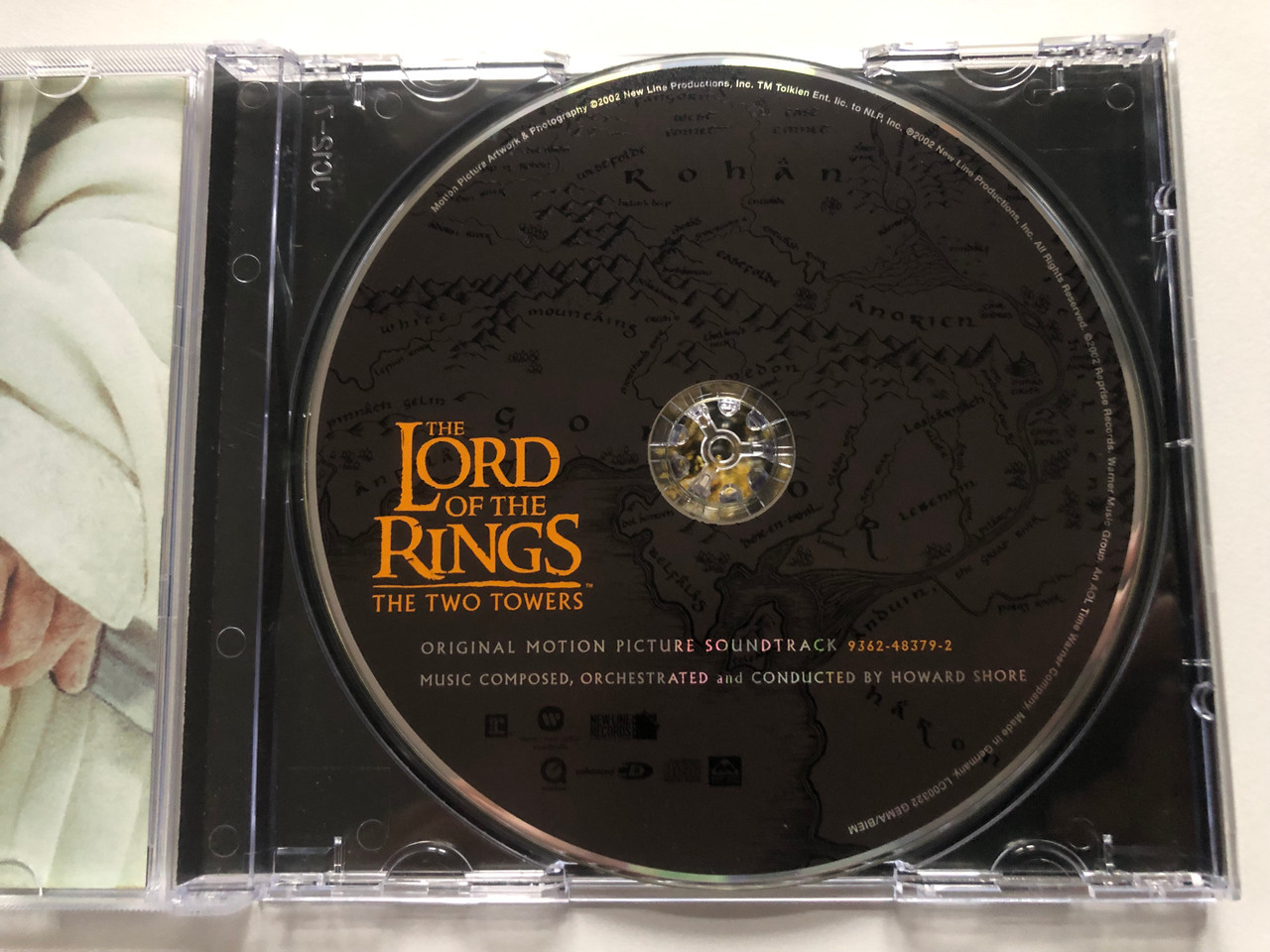https://cdn10.bigcommerce.com/s-62bdpkt7pb/products/0/images/216375/The_Lord_Of_The_Rings_The_Two_Towers_Original_Motion_Picture_Soundtrack_Music_Composed_Orchestrated_and_Conducted_By_Howard_Shore_Reprise_Records_Audio_CD_2002_9362-48379-2_3__76380.1647271806.1280.1280.JPG?c=2&_gl=1*lh045y*_ga*MjA2NTIxMjE2MC4xNTkwNTEyNTMy*_ga_WS2VZYPC6G*MTY0NzI3MDg0Ny4zMTkuMS4xNjQ3MjcxNzIyLjYw