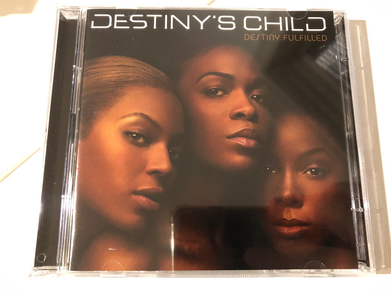 https://cdn10.bigcommerce.com/s-62bdpkt7pb/products/0/images/216627/Destinys_Child_Destiny_Fulfilled_Columbia_Audio_CD_DVD_Video_2004_517916_3_1__99217.1647455177.1280.1280.JPG?c=2&_gl=1*26jwbq*_ga*MjA2NTIxMjE2MC4xNTkwNTEyNTMy*_ga_WS2VZYPC6G*MTY0NzQ0MjQ1MS4zMjIuMS4xNjQ3NDU1MDMyLjUw